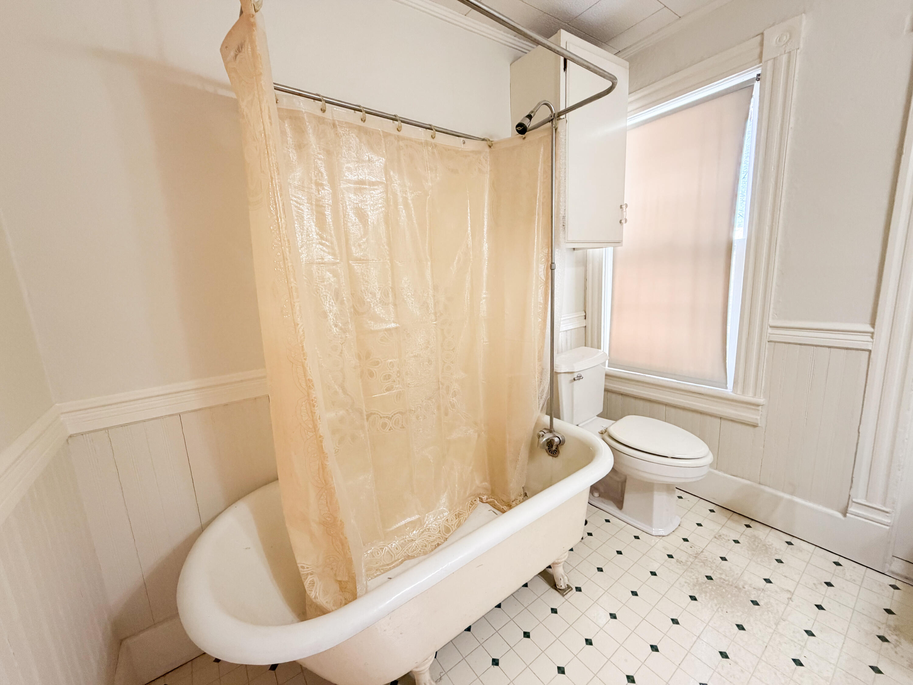 226 West Locust Street Covington, VA 24426 - Photo 33 of 45 a bathroom with a shower curtain and a sink