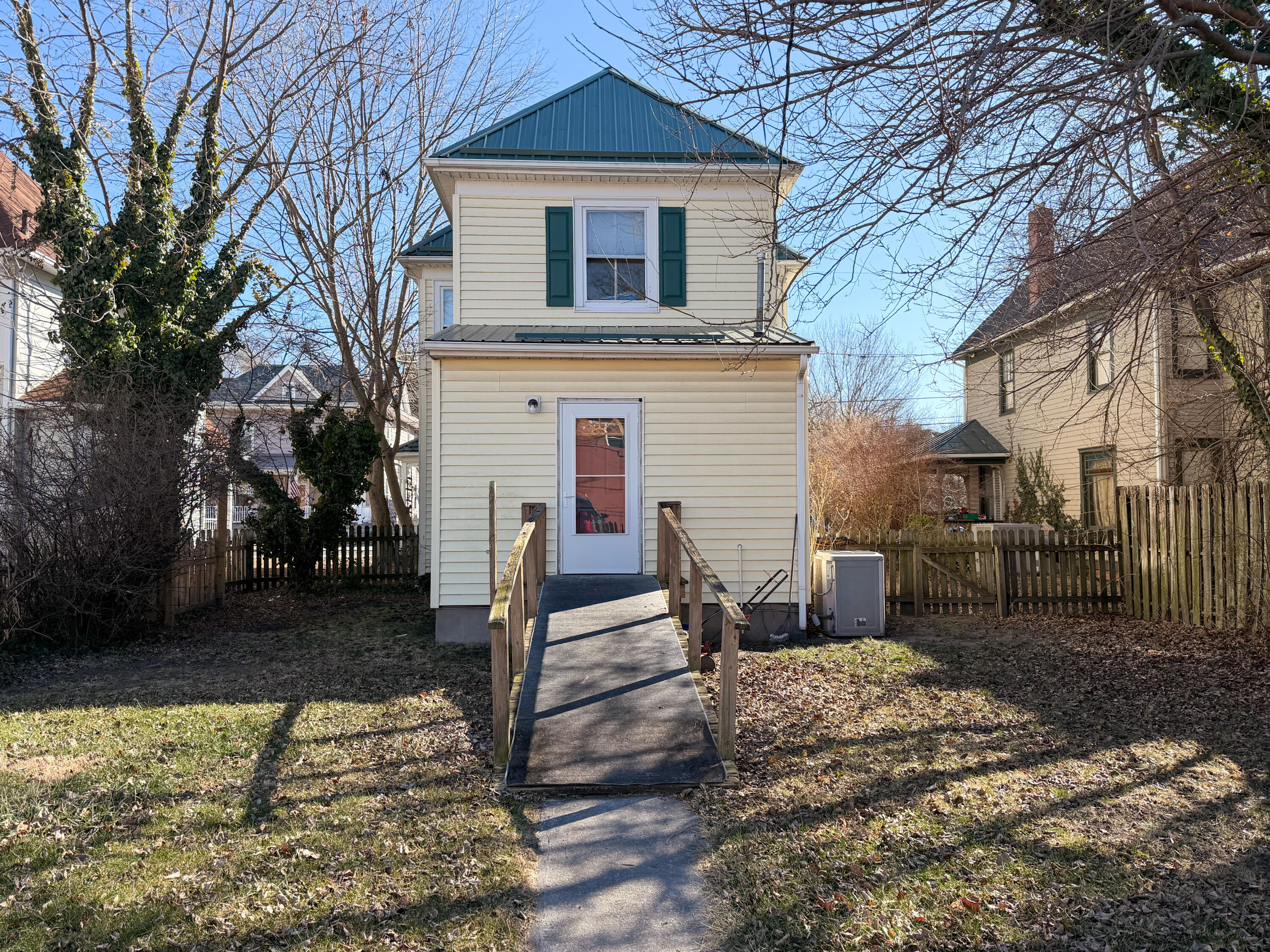 226 West Locust Street Covington, VA 24426 - Photo 36 of 45 a front view of a house with a yard