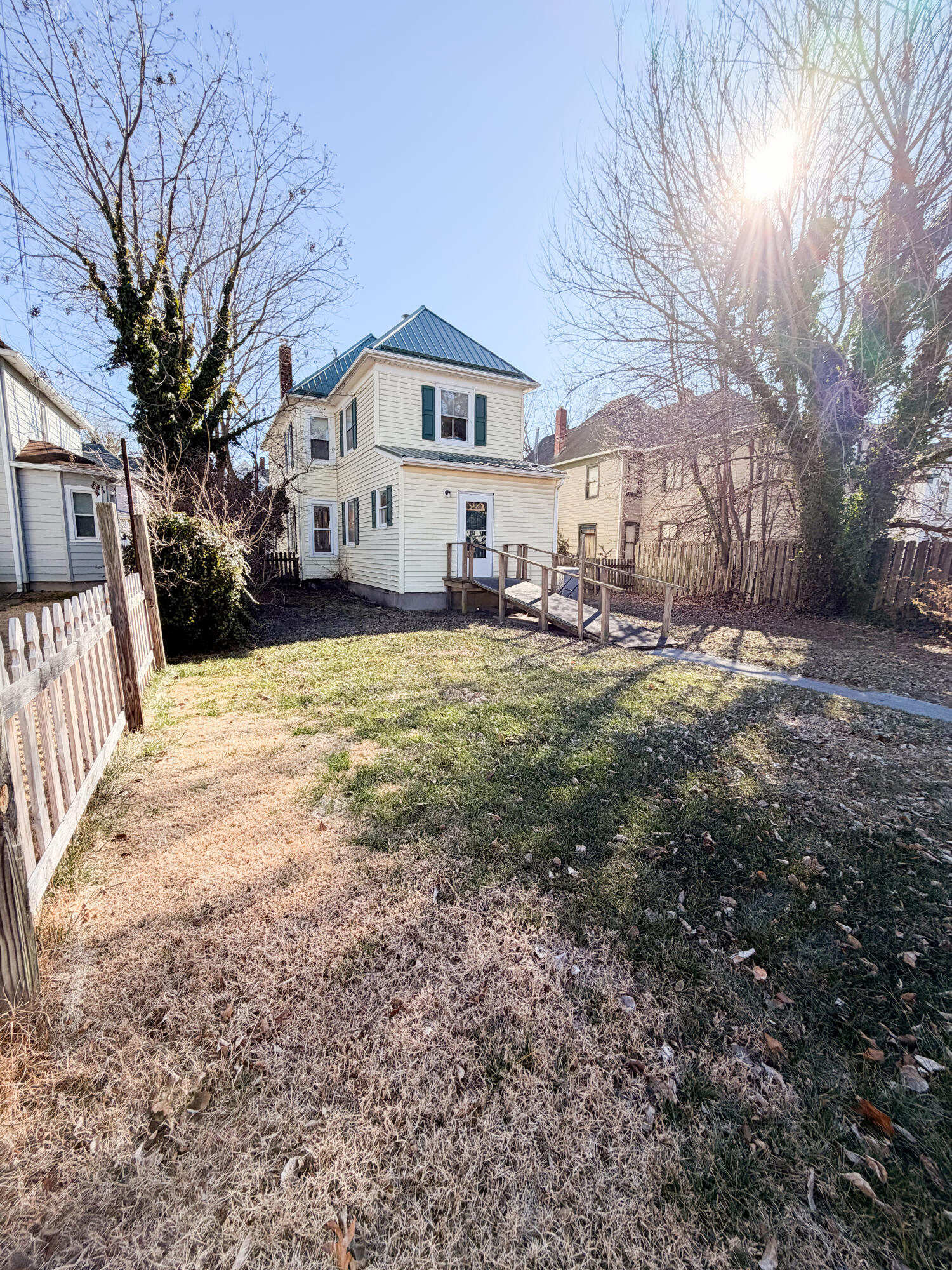 226 West Locust Street Covington, VA 24426 - Photo 40 of 45 a view of a house with a yard covered in snow