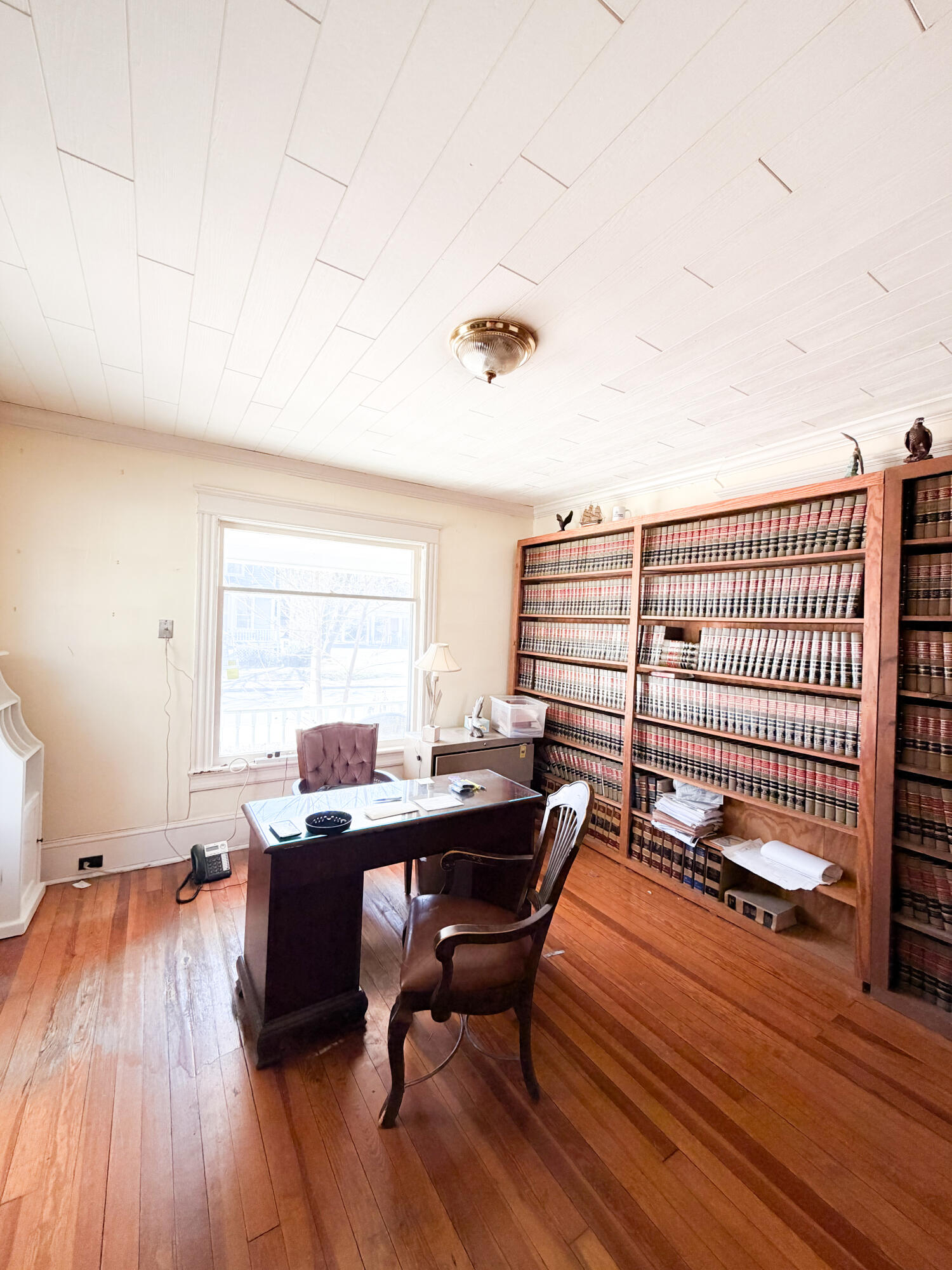 226 West Locust Street Covington, VA 24426 - Photo 10 of 45 a workspace with furniture and wooden floor