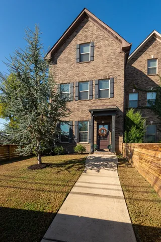a front view of a house with swimming pool