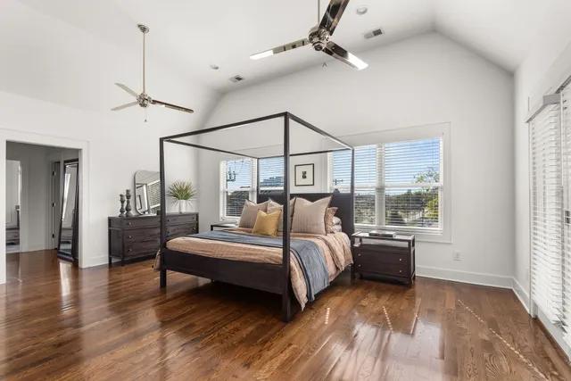 a view of balcony with wooden floor and fence