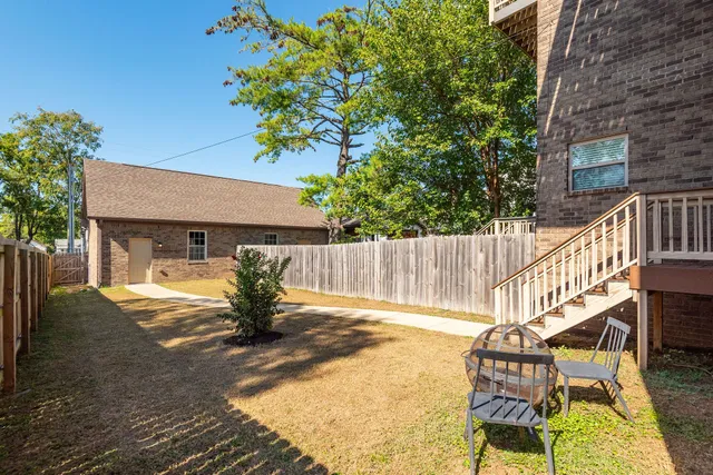 a front view of a house with a garage