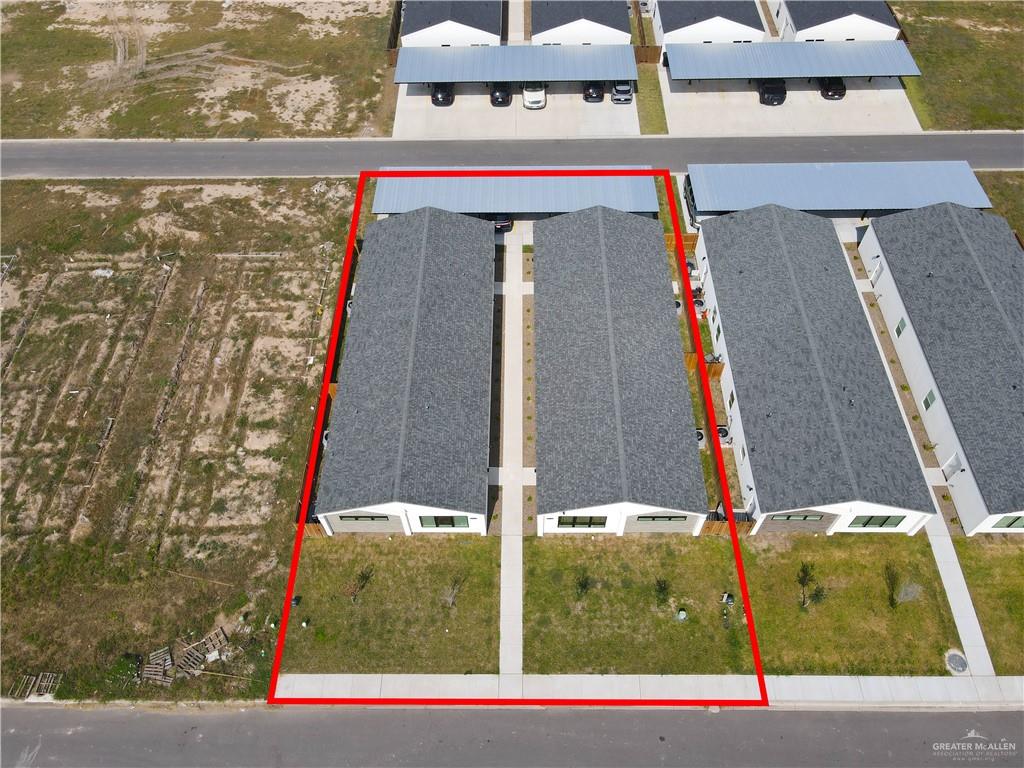 2612 Robin Road, Unit #3 Weslaco, TX 78596 - Photo 17 of 23 a view of swimming pool with a yard