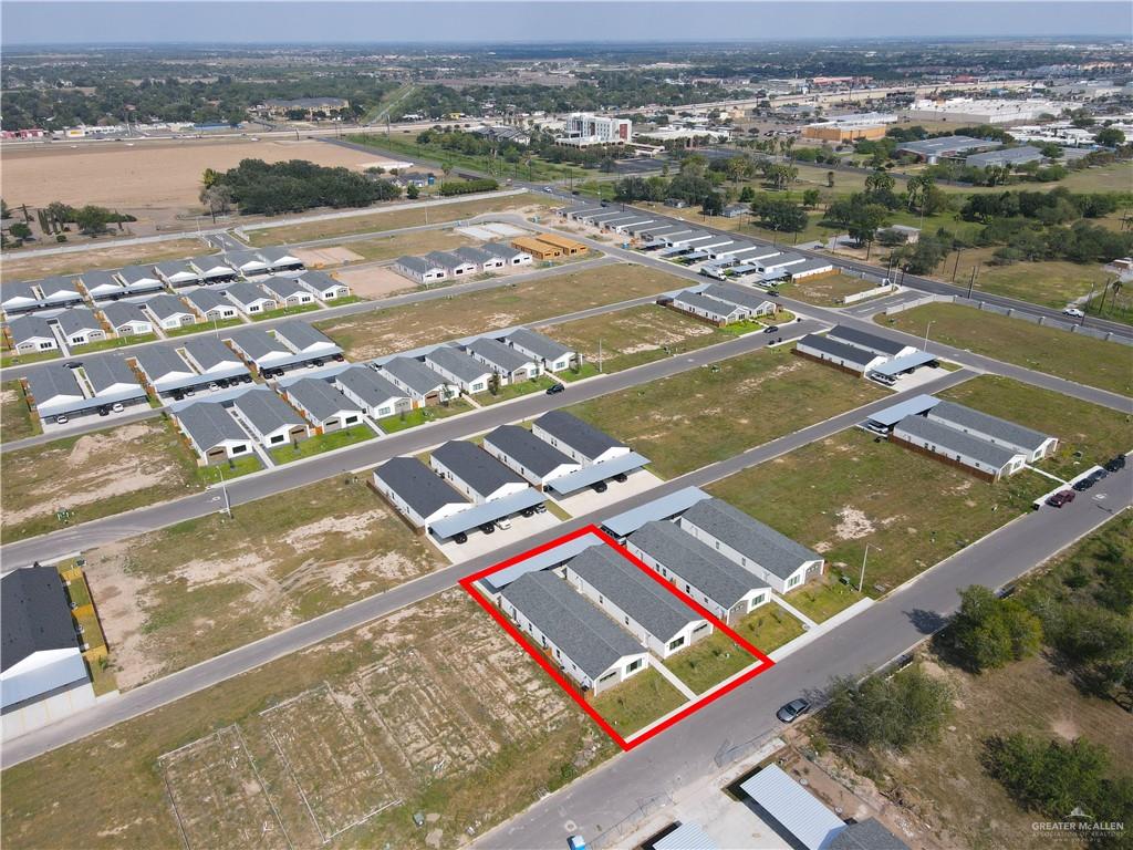 2612 Robin Road, Unit #3 Weslaco, TX 78596 - Photo 23 of 23 an aerial view of residential houses with outdoor space