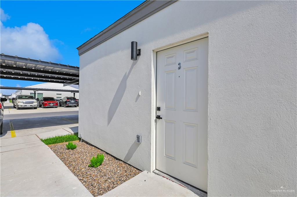 2612 Robin Road, Unit #3 Weslaco, TX 78596 - Photo 4 of 23 a view of entryway with wooden floor
