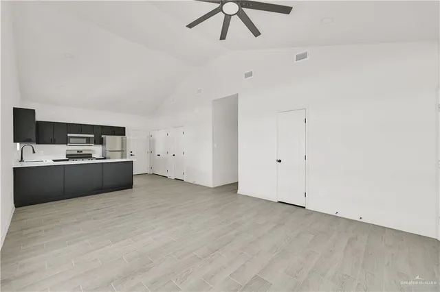 a view of kitchen with wooden floor