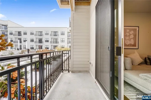 a view of a balcony from a hallway