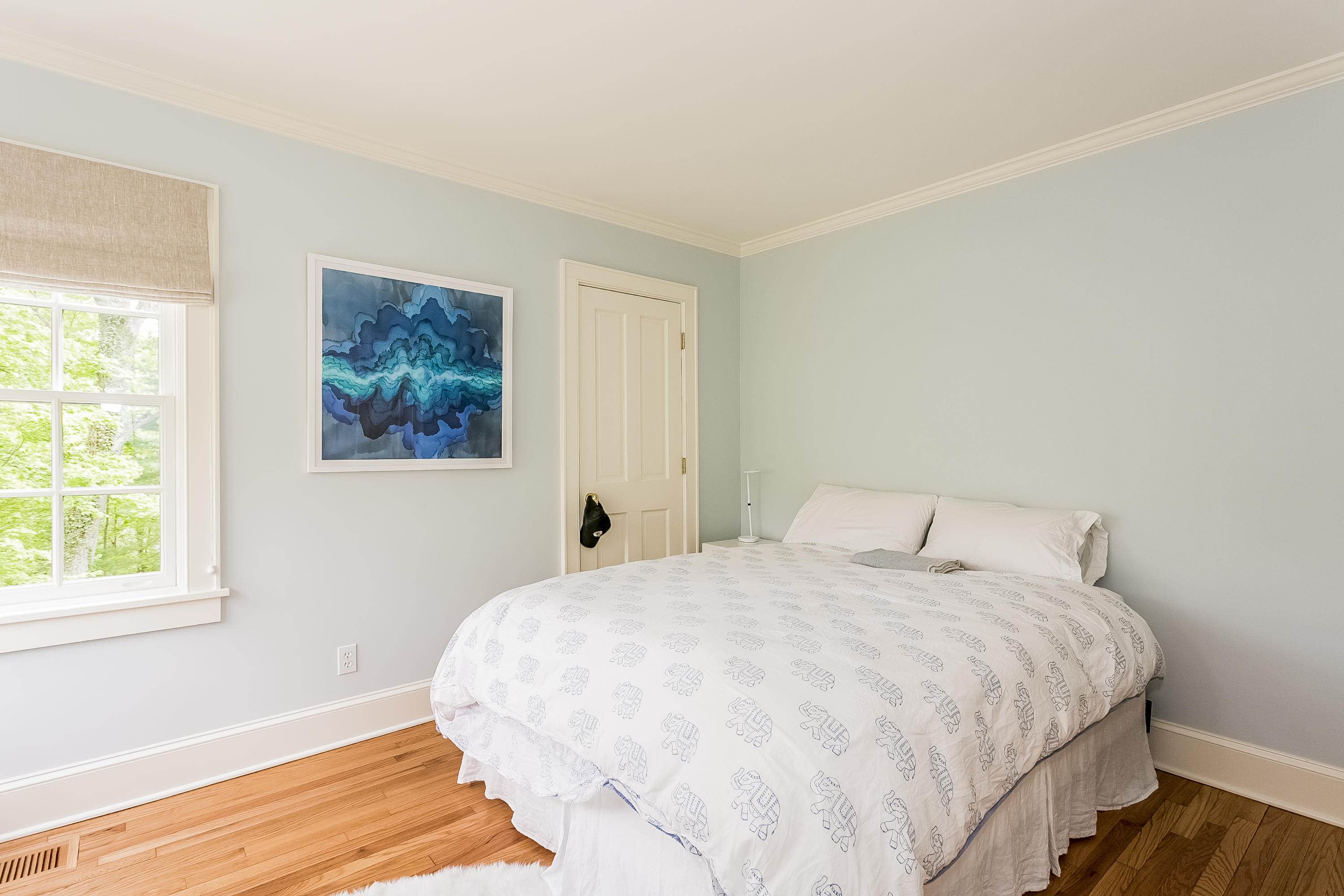 33 Tory Hole Road Darien, CT 06820 - Photo 15 of 24 a bedroom with a bed and a window