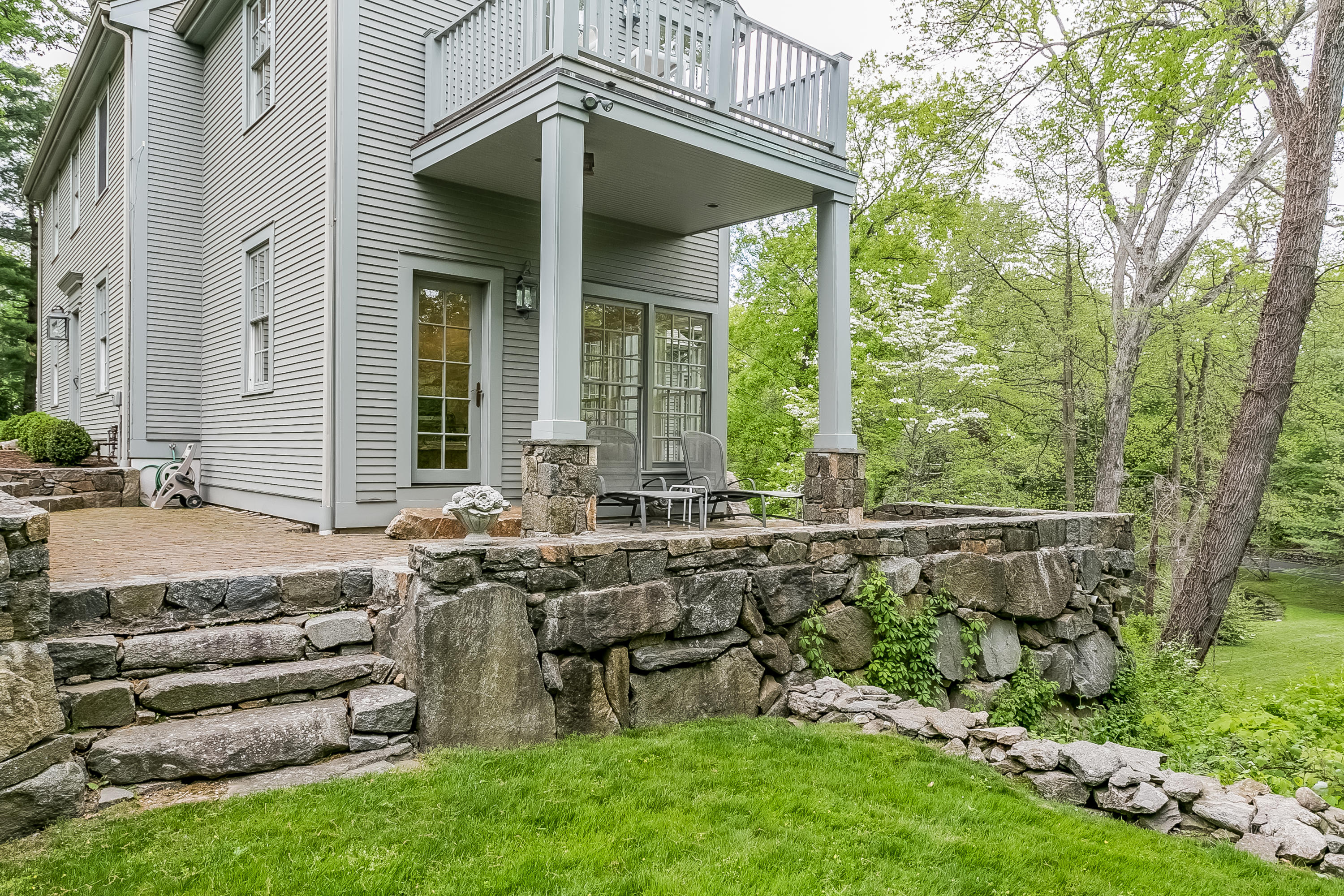 33 Tory Hole Road Darien, CT 06820 - Photo 19 of 24 front view of a house with a garden