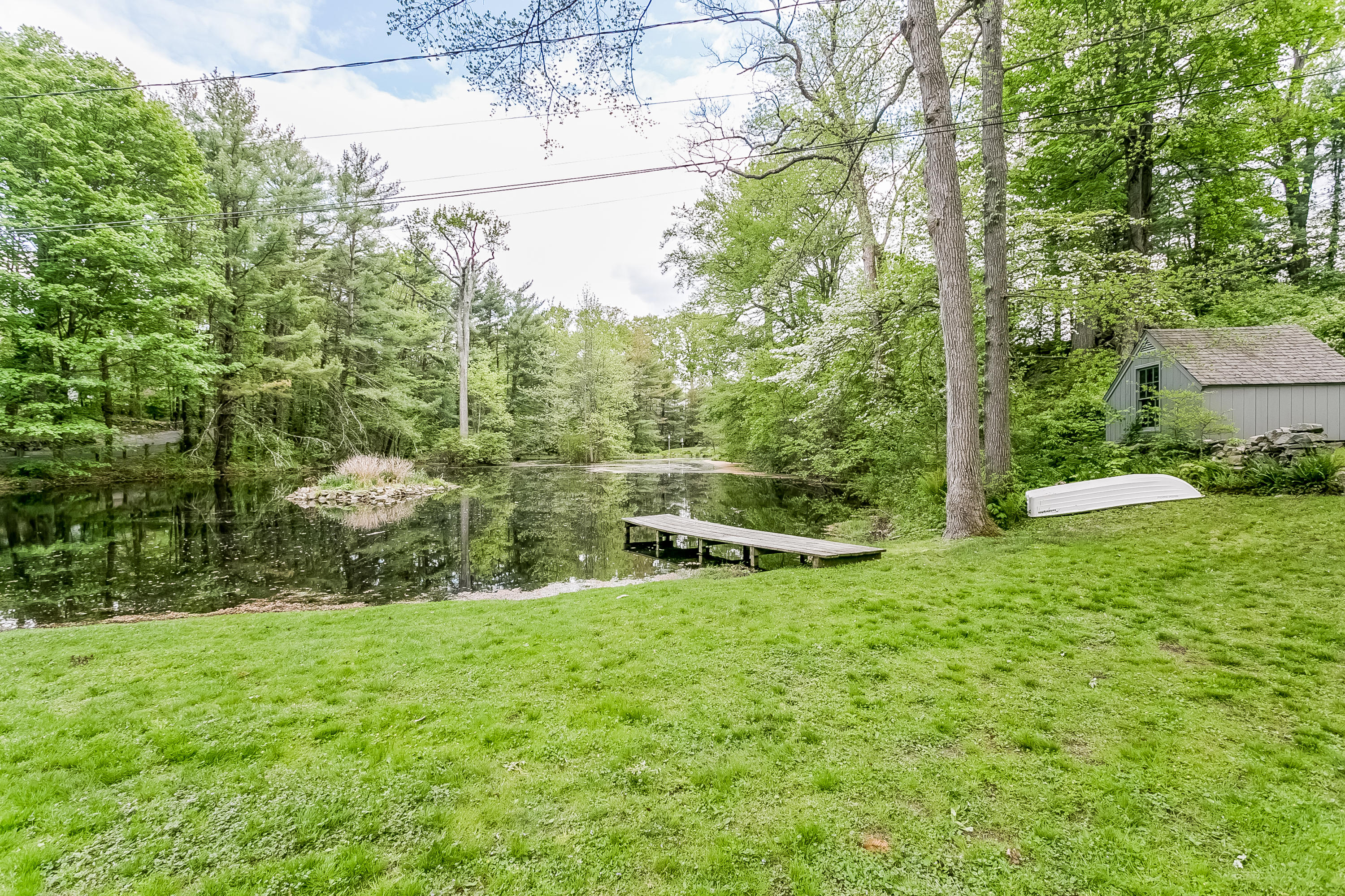 33 Tory Hole Road Darien, CT 06820 - Photo 21 of 24 a view of a backyard with a garden