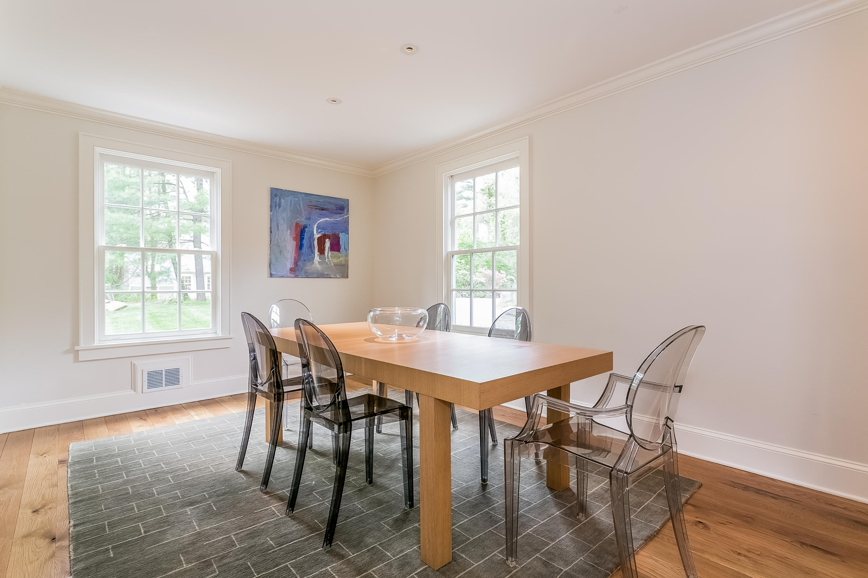 33 Tory Hole Road Darien, CT 06820 - Photo 7 of 24 a view of a dining room with furniture and wooden floor