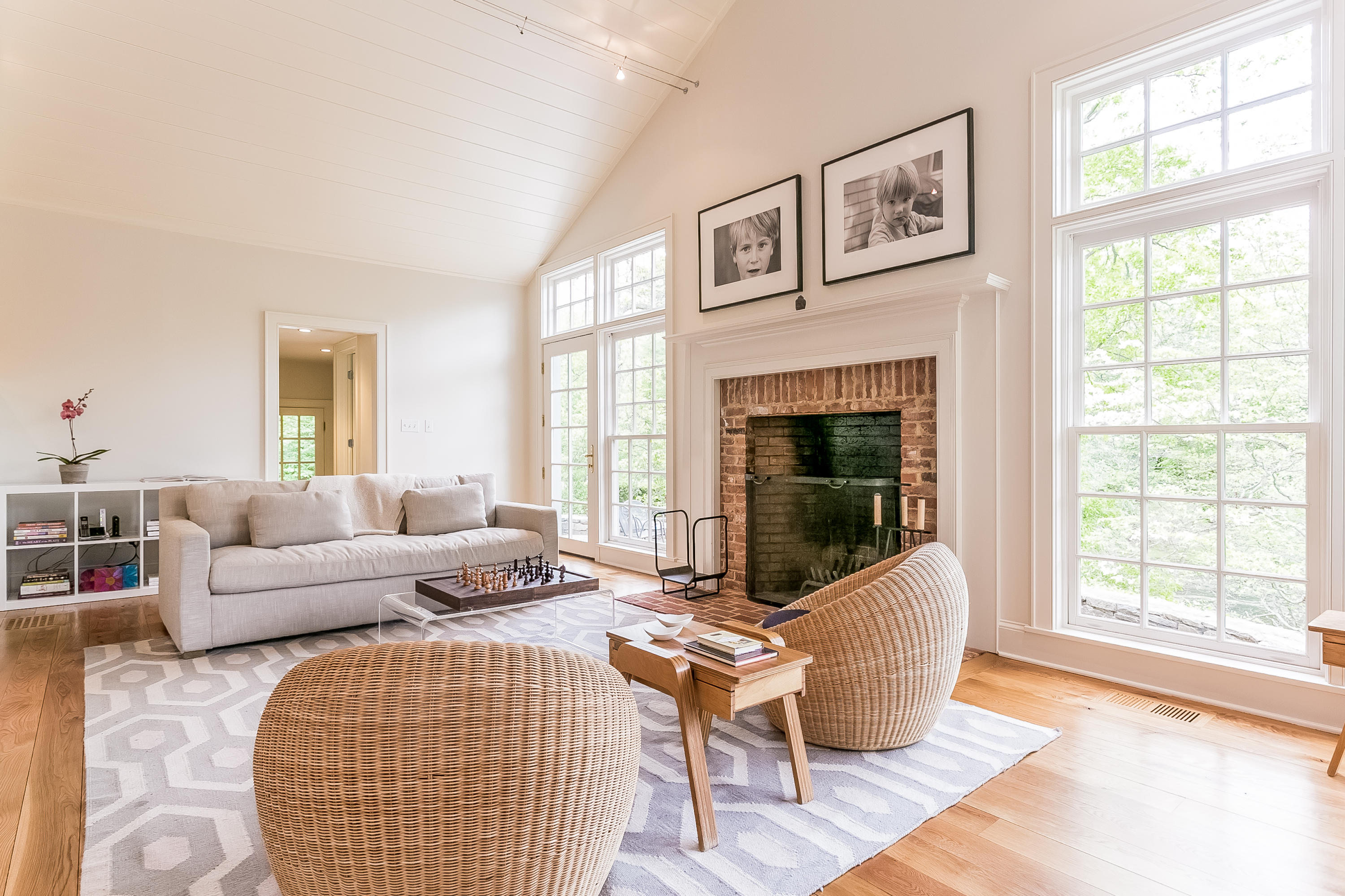 33 Tory Hole Road Darien, CT 06820 - Photo 10 of 24 a living room with furniture a fireplace and a large window