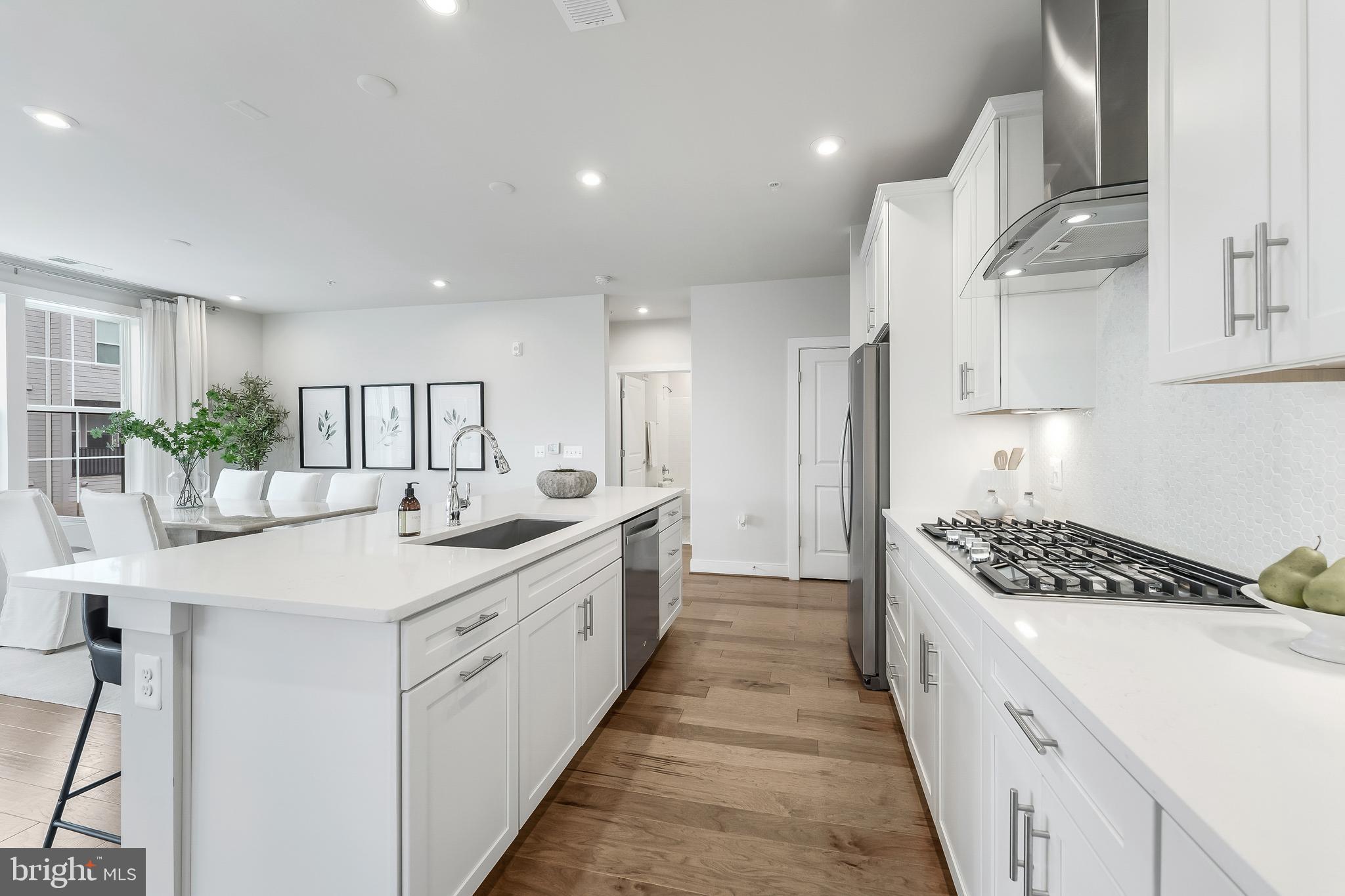 2320 Field Point Road, Unit 201 Herndon, VA 20171 - Photo 11 of 47 a kitchen with cabinets and window
