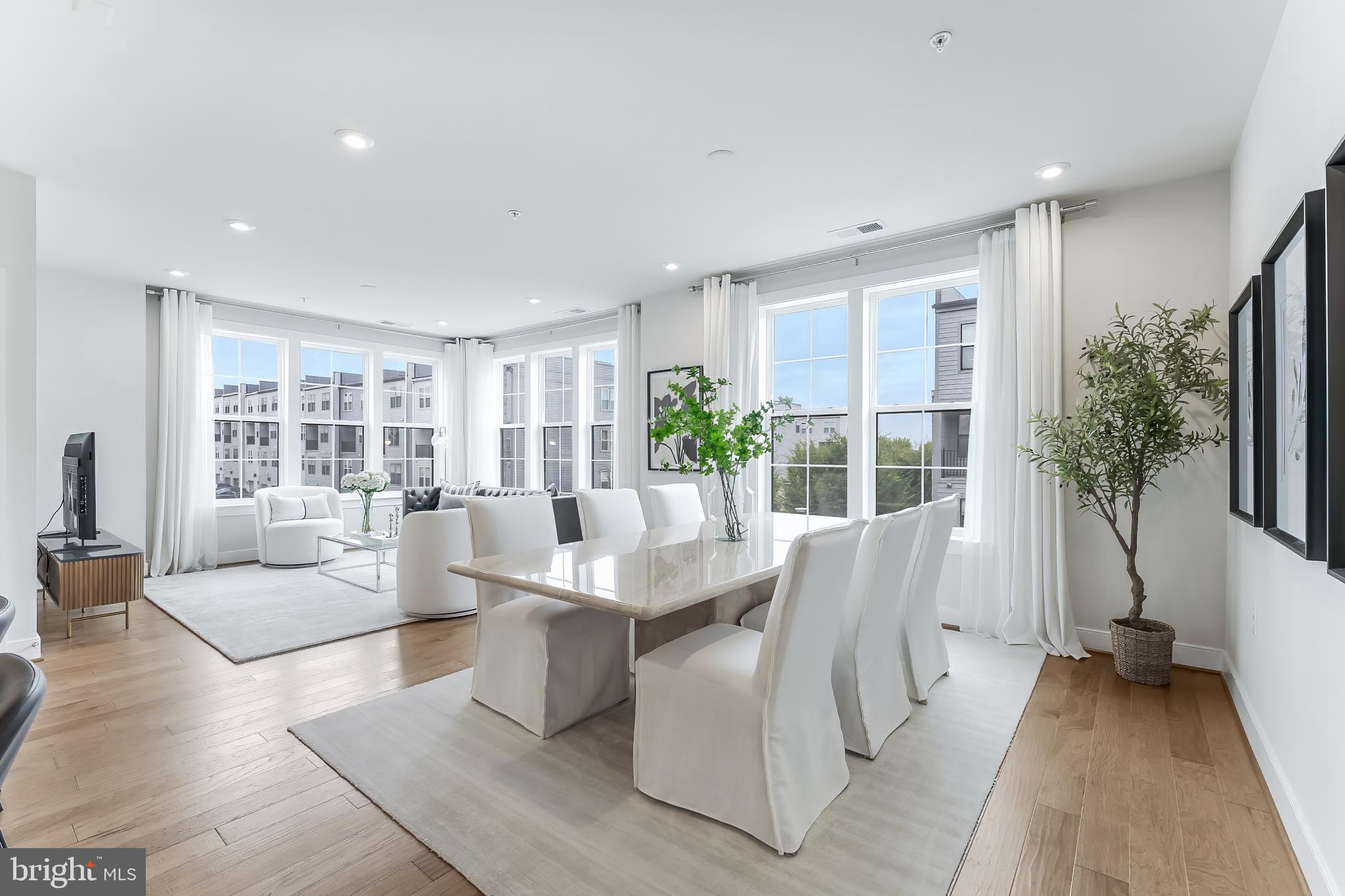 2320 Field Point Road, Unit 201 Herndon, VA 20171 - Photo 18 of 47 a living room with furniture and a large window