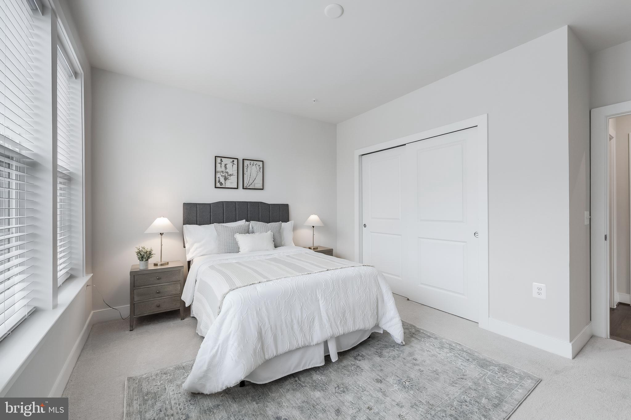 2320 Field Point Road, Unit 201 Herndon, VA 20171 - Photo 34 of 47 a bedroom with a bed and a window