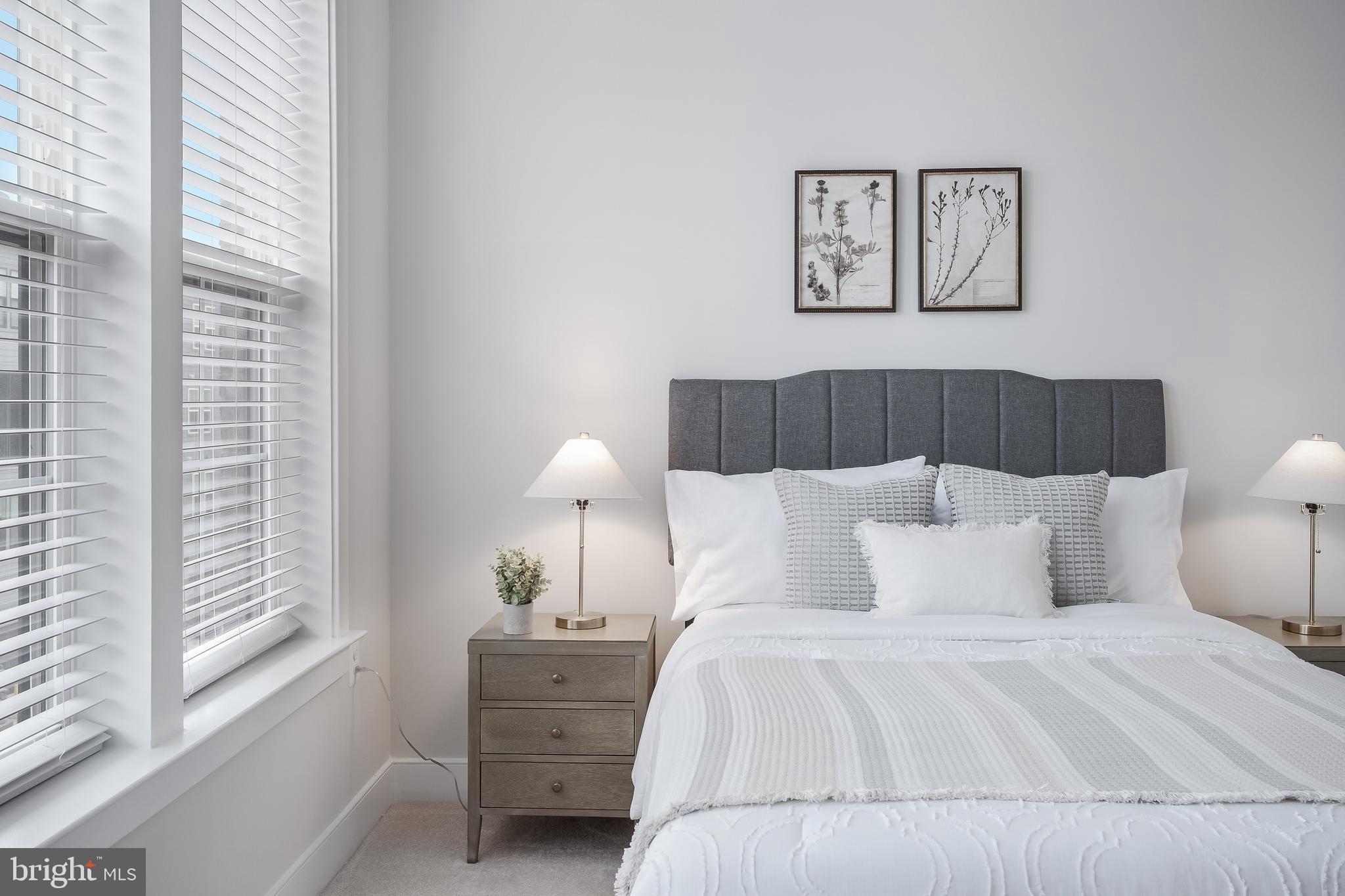 2320 Field Point Road, Unit 201 Herndon, VA 20171 - Photo 37 of 47 a bedroom with a bed and a window