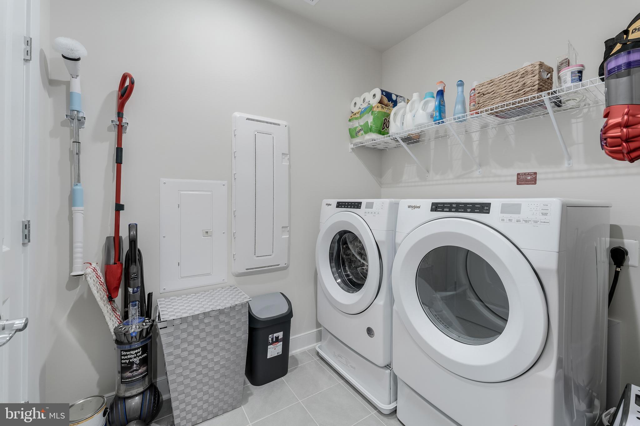 2320 Field Point Road, Unit 201 Herndon, VA 20171 - Photo 40 of 47 a utility room with dryer and washer