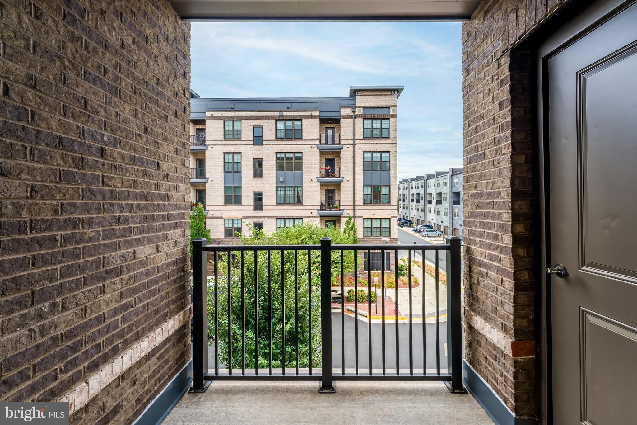 2320 Field Point Road, Unit 201 Herndon, VA 20171 - Photo 44 of 47 a view of a building from a balcony