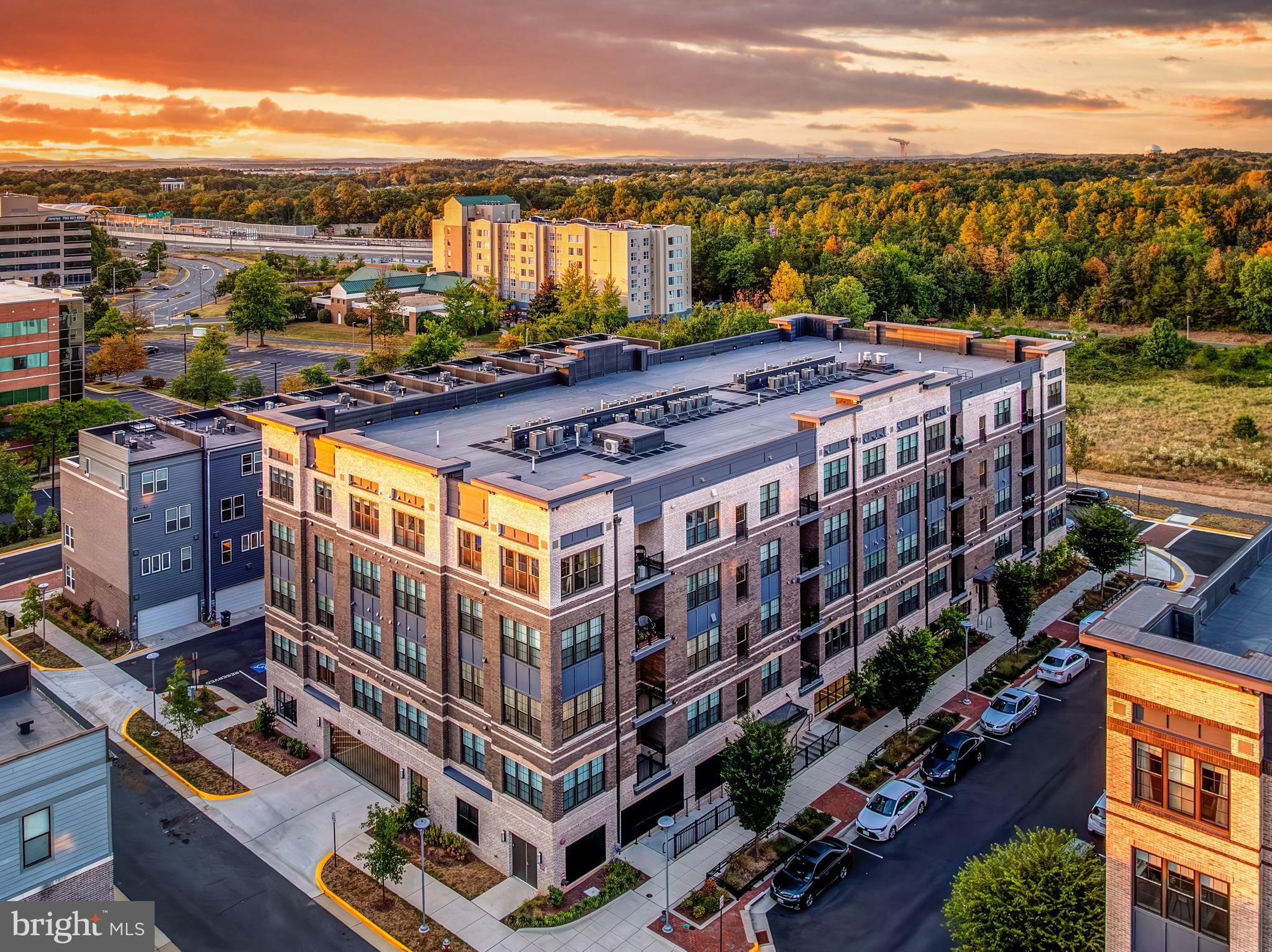 2320 Field Point Road, Unit 201 Herndon, VA 20171 - Photo 5 of 47 a view of a city with tall buildings