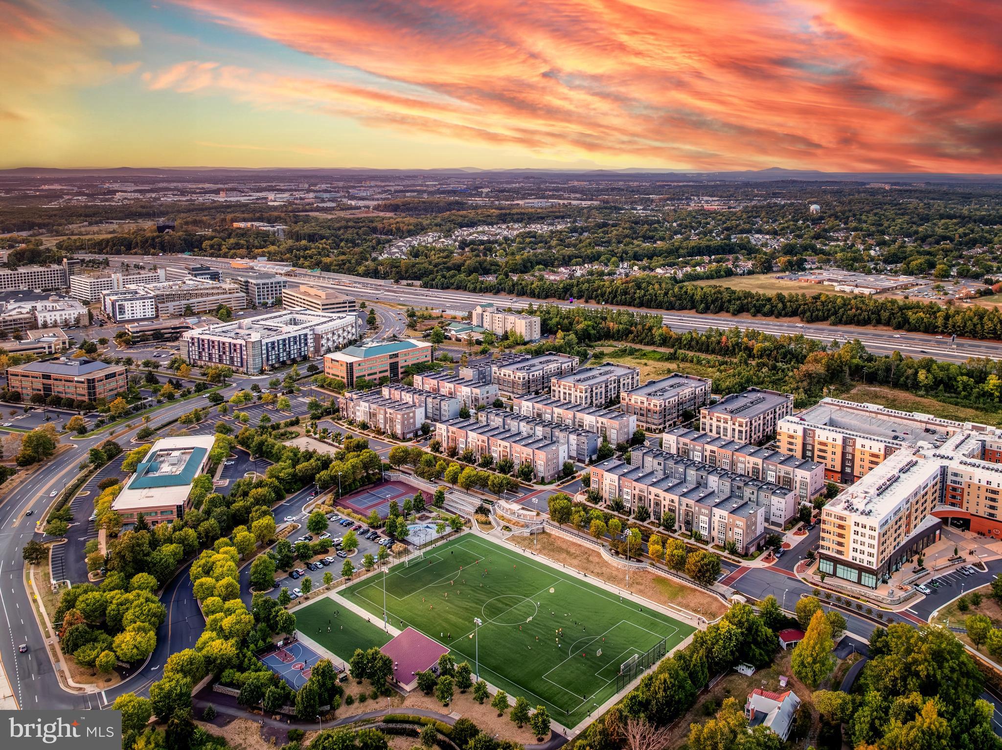 2320 Field Point Road, Unit 201 Herndon, VA 20171 - Photo 6 of 47 an aerial view of residential houses with outdoor space