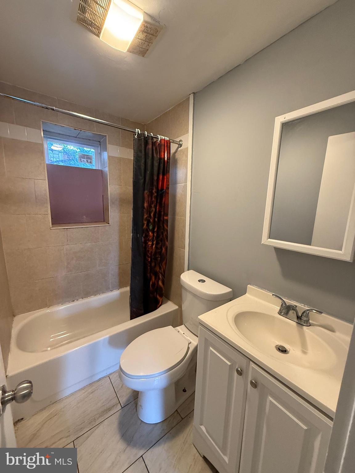 3440 Crystal Street Philadelphia, PA 19134 - Photo 7 of 13 a bathroom with a sink toilet and shower