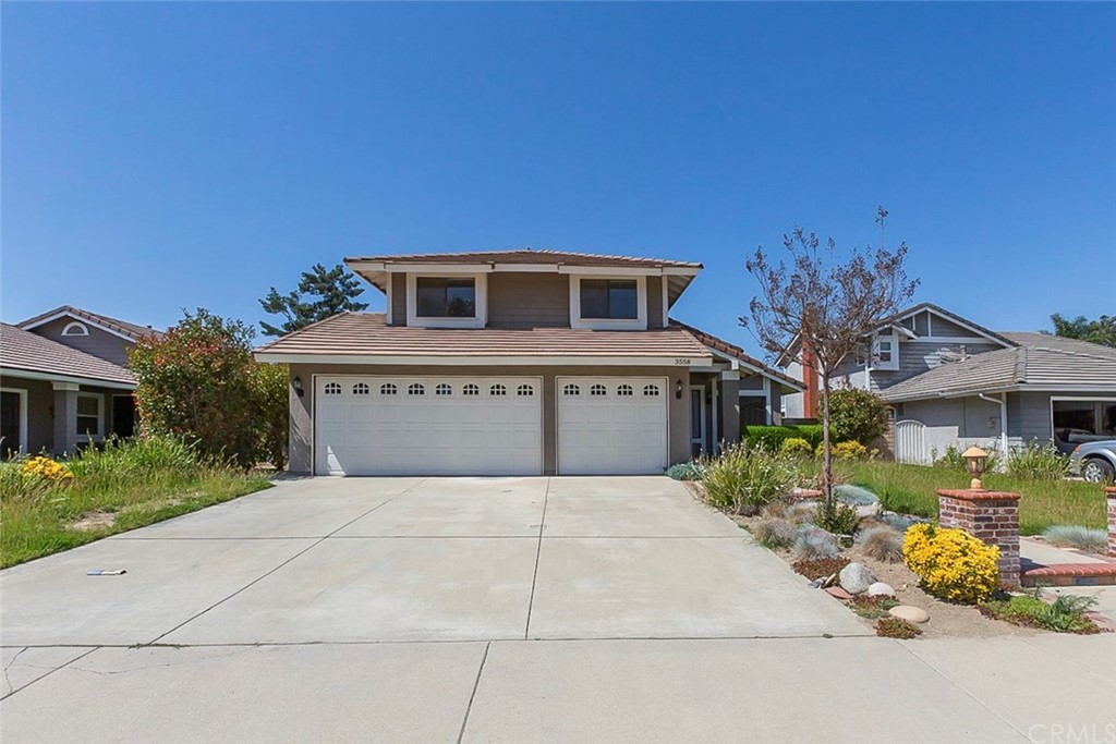3558 Hillsdale Ranch Road Chino Hills, CA 91709 - Photo 1 of 1 a front view of a house with a yard