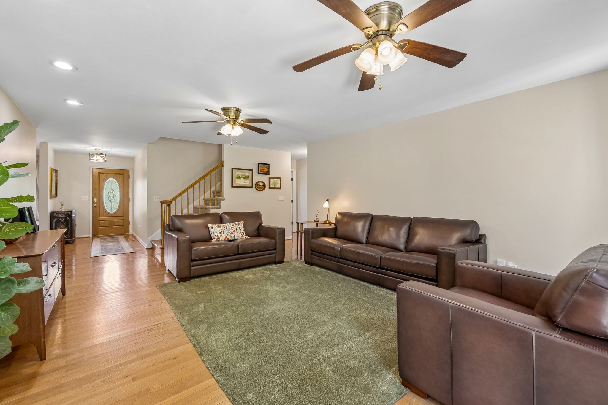 1915 Greenwood Road Charlotte, TN 37036 - Photo 14 of 60 a living room with furniture and a ceiling fan