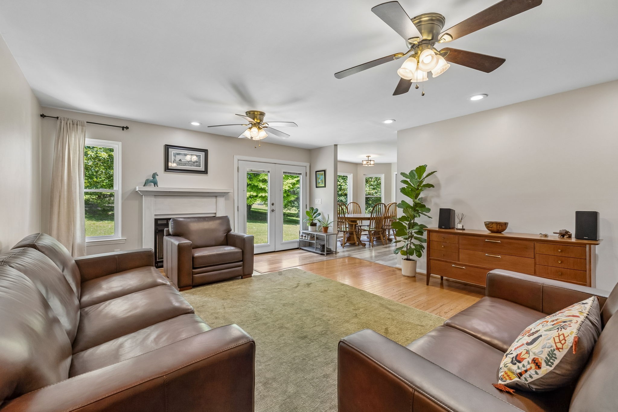 1915 Greenwood Road Charlotte, TN 37036 - Photo 17 of 60 a living room with furniture and a fireplace