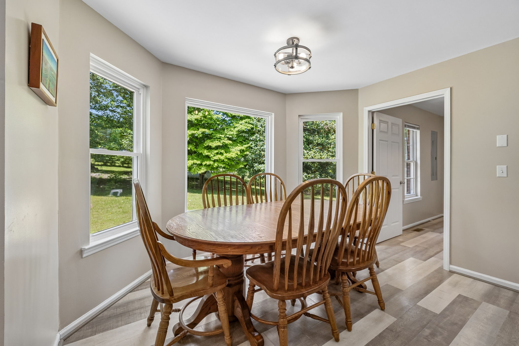 1915 Greenwood Road Charlotte, TN 37036 - Photo 18 of 60 a view of a dining room with furniture window and outside view