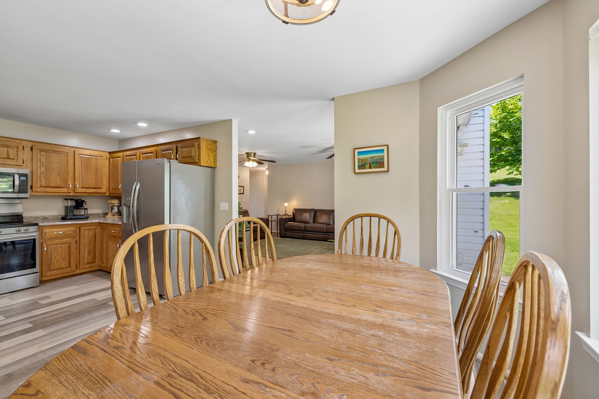 1915 Greenwood Road Charlotte, TN 37036 - Photo 19 of 60 a view of a dining room with furniture and a window