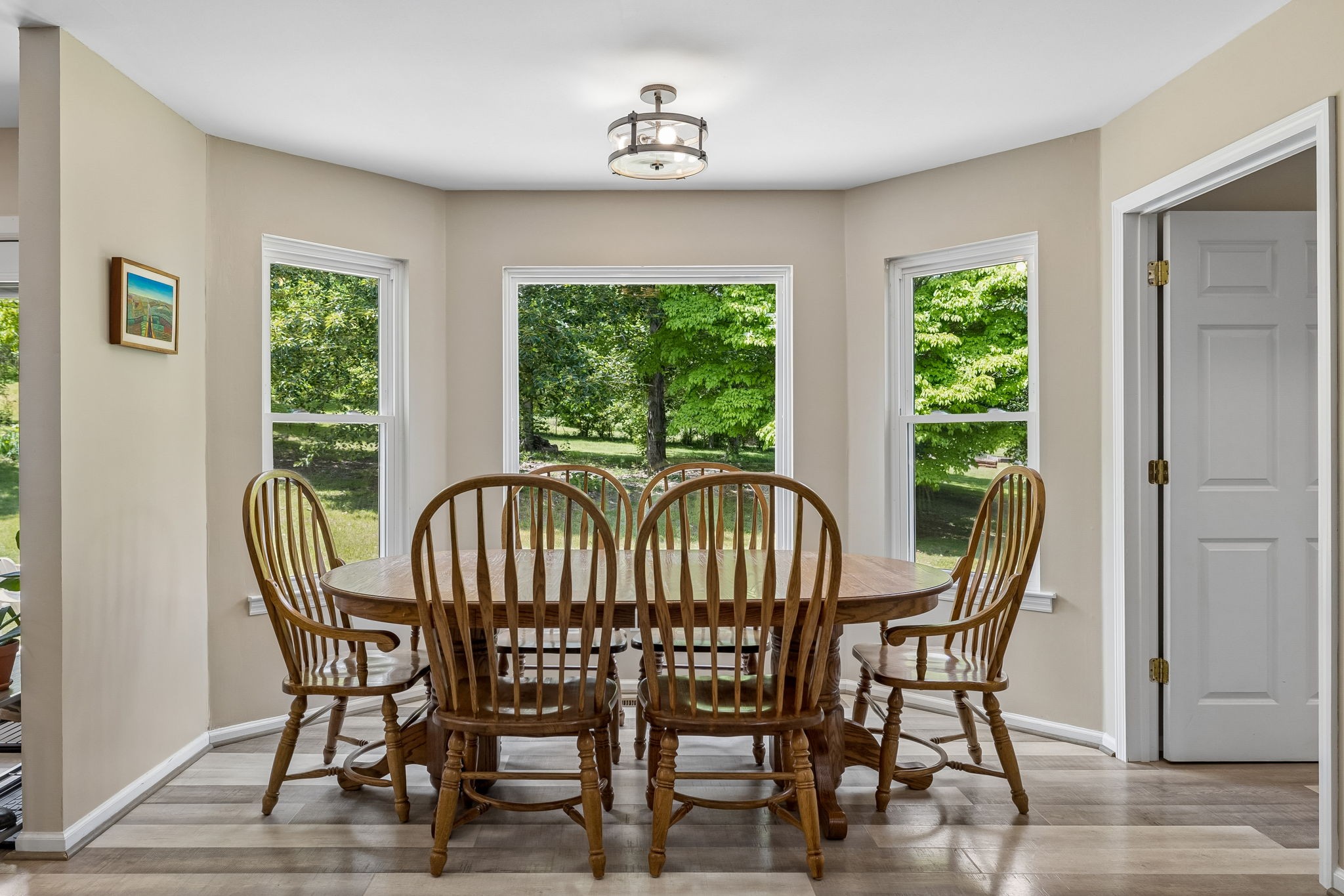 1915 Greenwood Road Charlotte, TN 37036 - Photo 20 of 60 a view of a dining room with furniture window and outside view