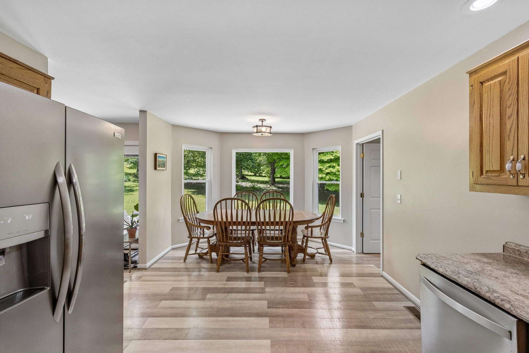 1915 Greenwood Road Charlotte, TN 37036 - Photo 22 of 60 a view of a dining room with furniture window and outside view