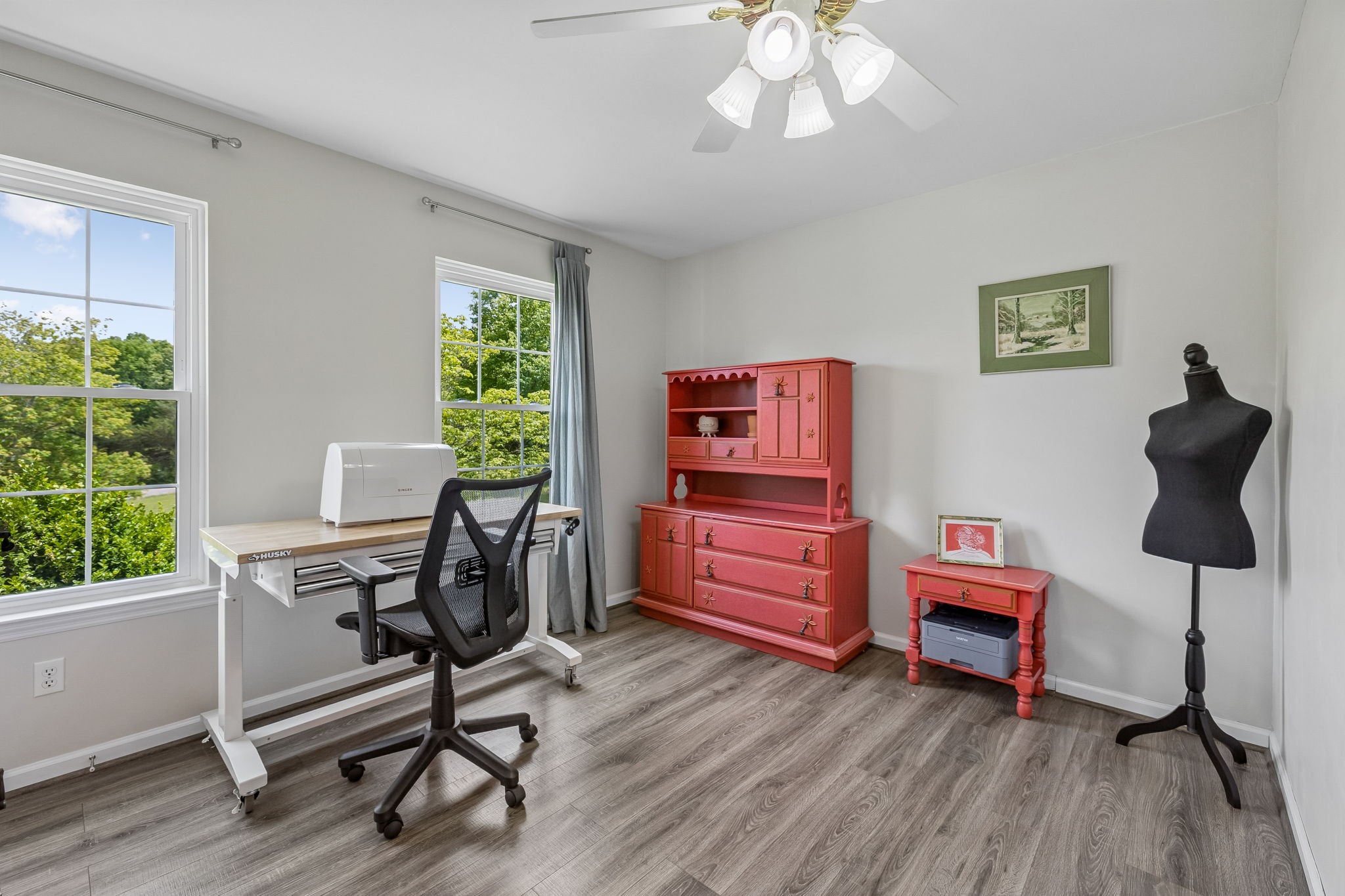 1915 Greenwood Road Charlotte, TN 37036 - Photo 34 of 60 a view of a workspace with furniture and a window