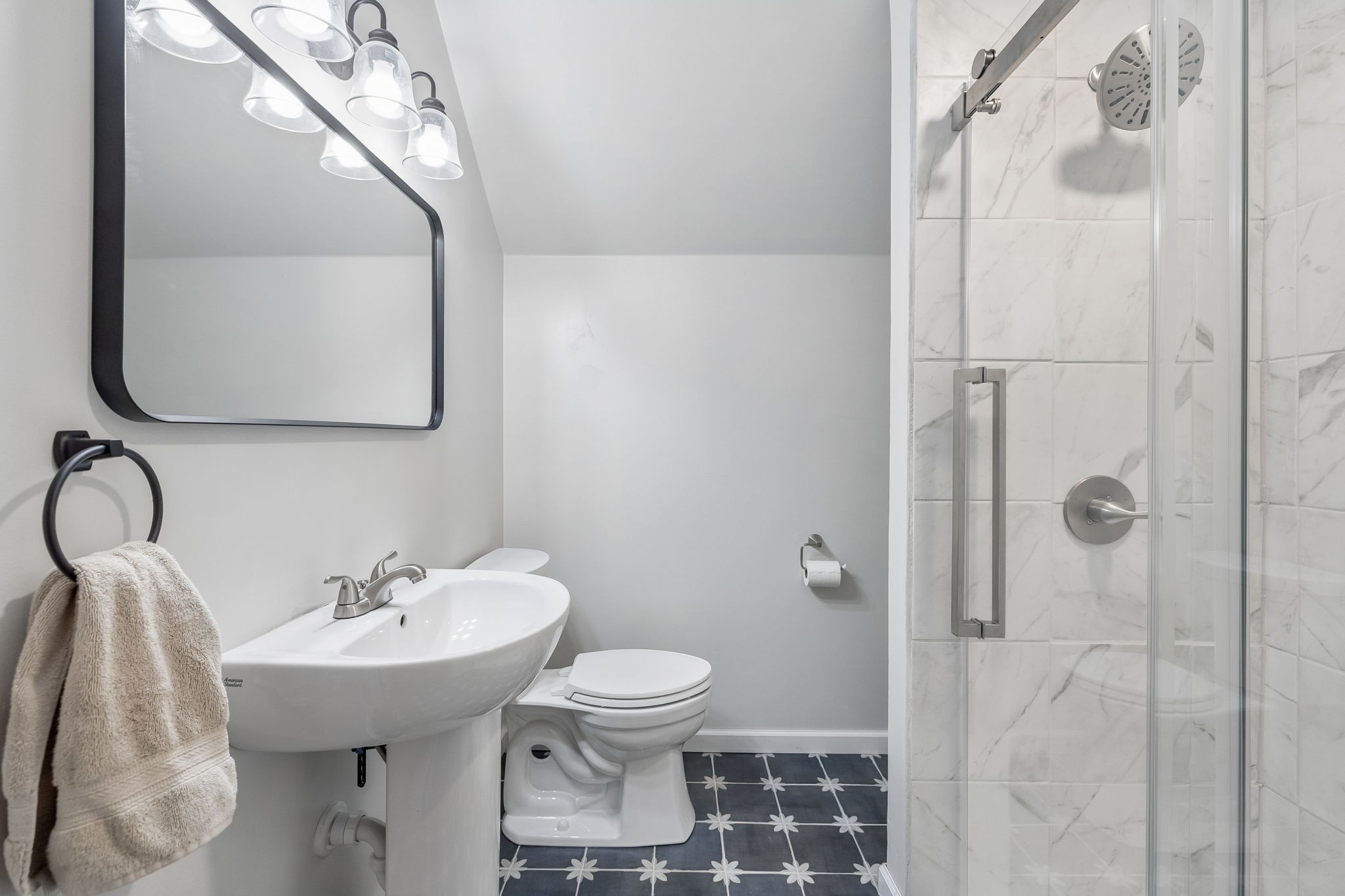 1915 Greenwood Road Charlotte, TN 37036 - Photo 39 of 60 a bathroom with a sink toilet and shower