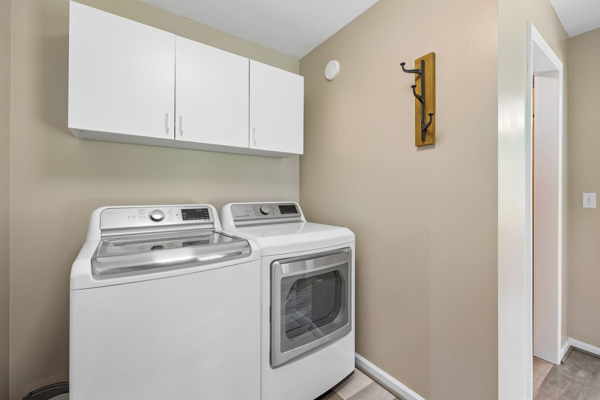 1915 Greenwood Road Charlotte, TN 37036 - Photo 42 of 60 a utility room with dryer and washer