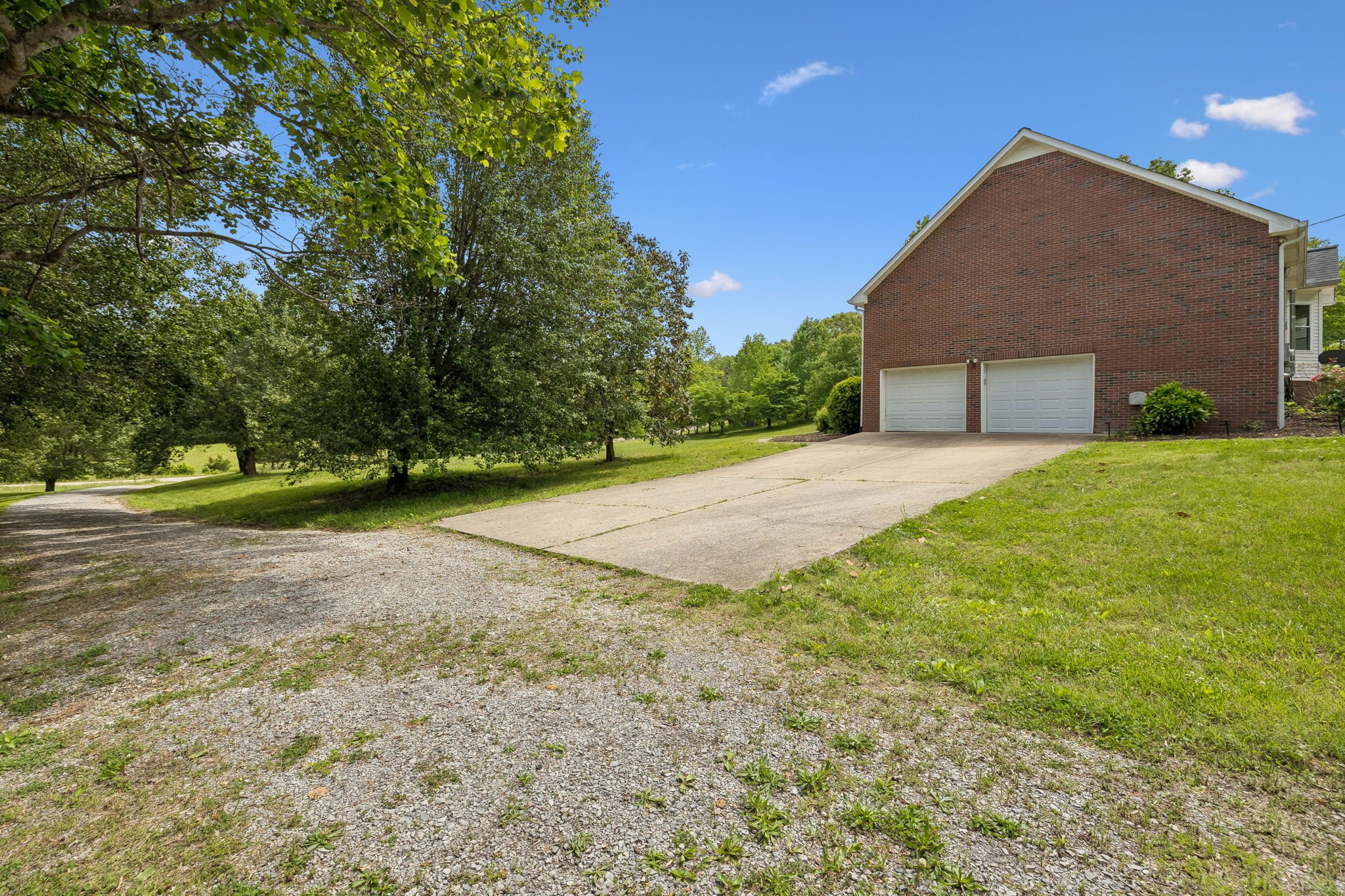 1915 Greenwood Road Charlotte, TN 37036 - Photo 50 of 60 a front view of a house with a yard