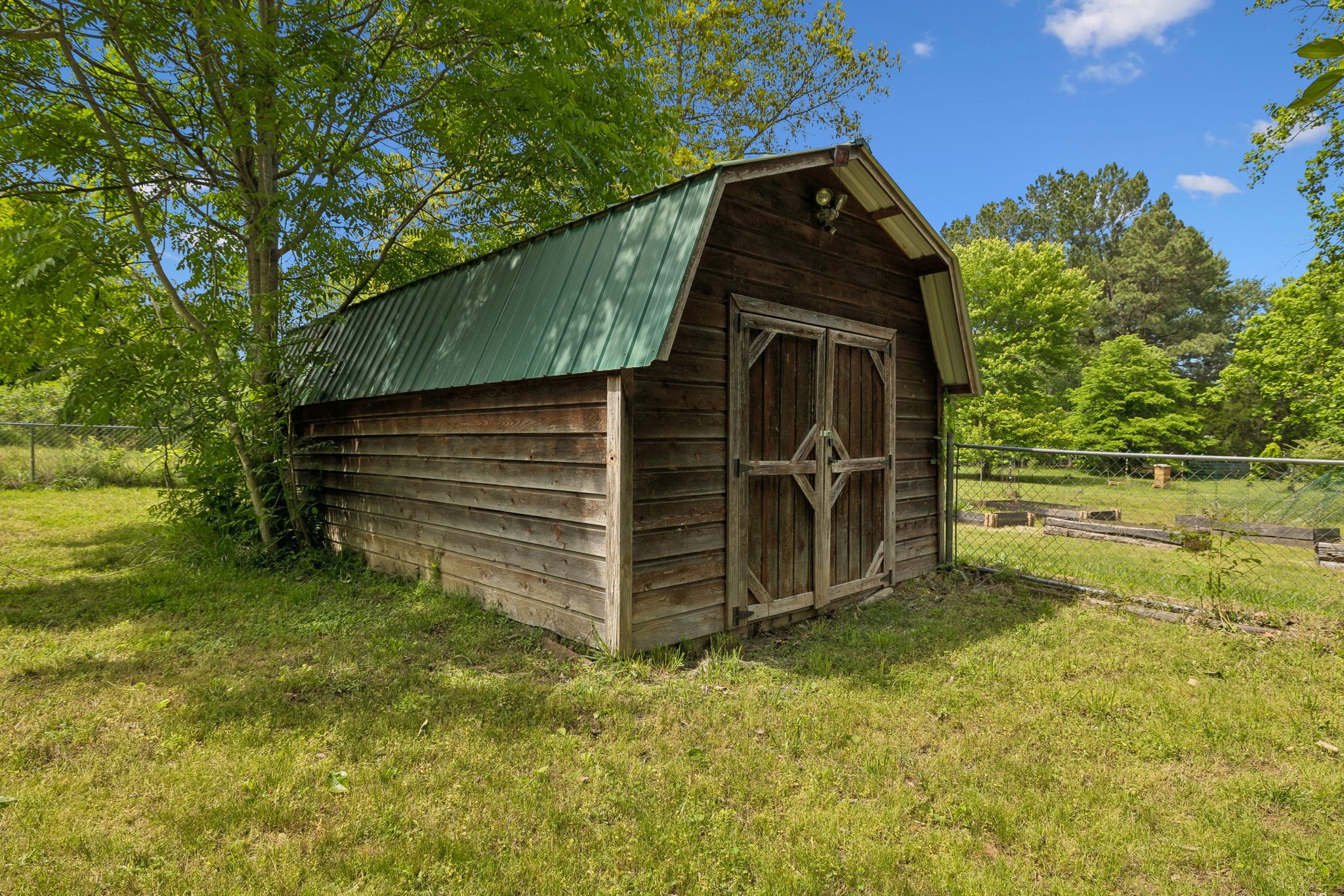 1915 Greenwood Road Charlotte, TN 37036 - Photo 51 of 60 a view of a house with a yard