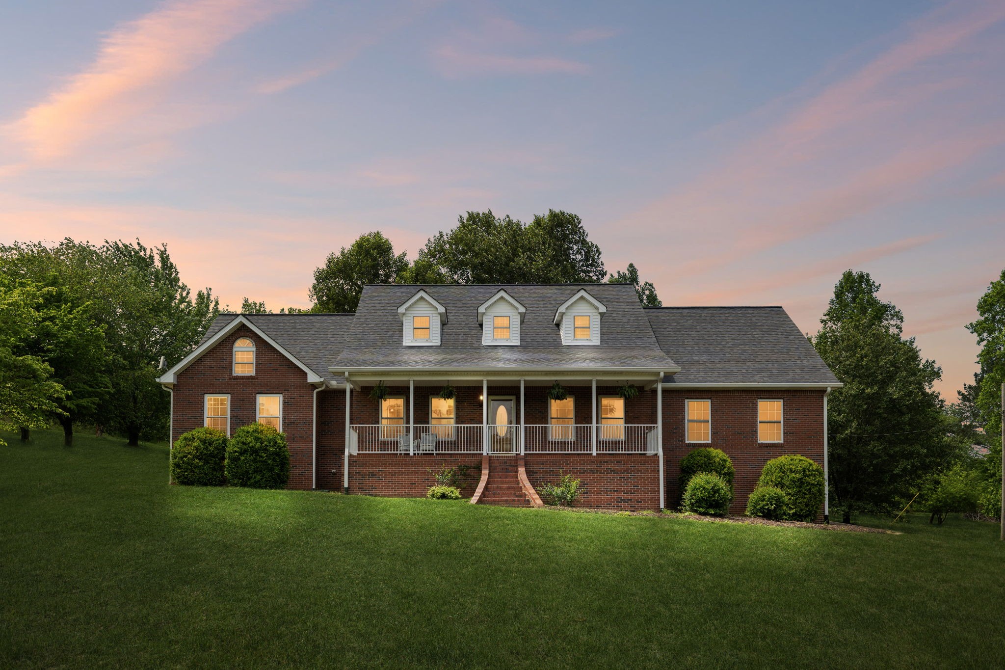1915 Greenwood Road Charlotte, TN 37036 - Photo 60 of 60 a front view of a house with yard and green space