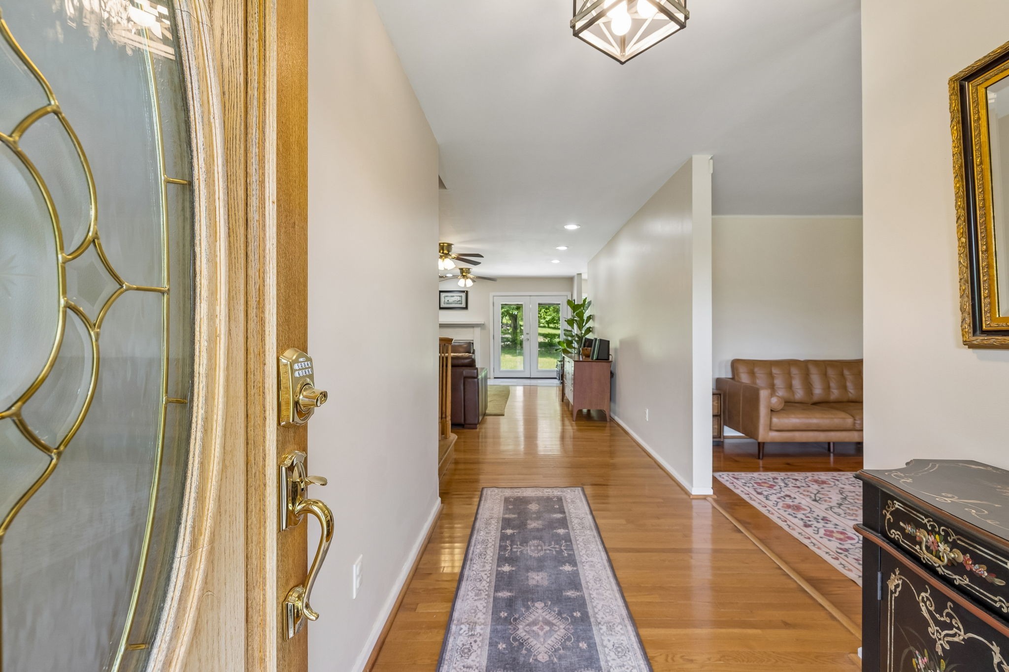 1915 Greenwood Road Charlotte, TN 37036 - Photo 8 of 60 a hallway with wooden floor windows and livingroom
