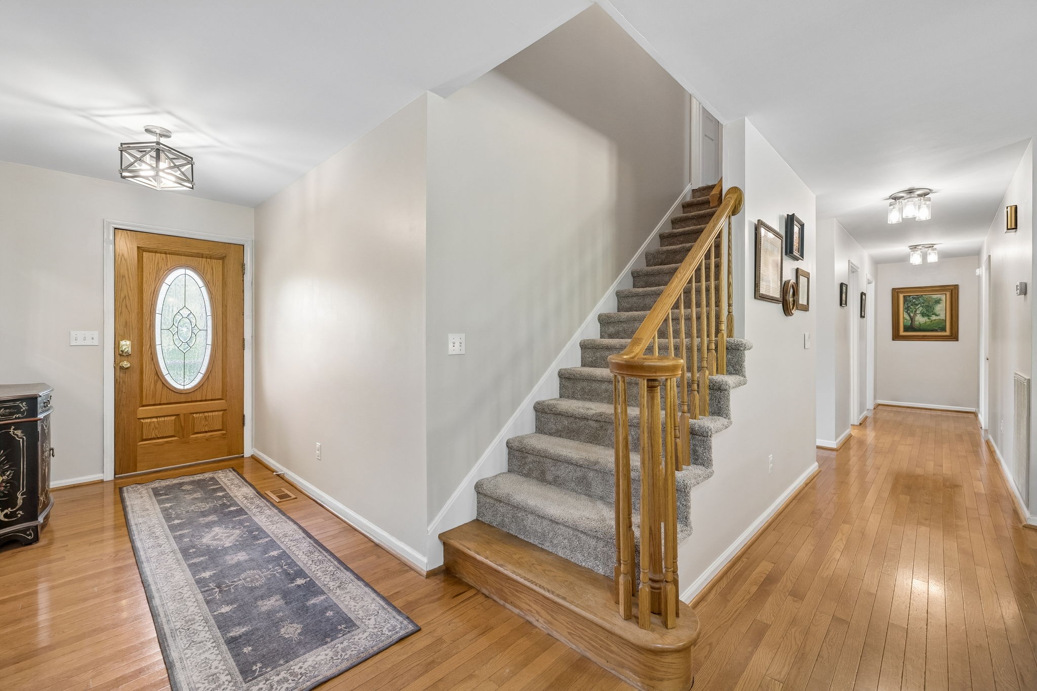 1915 Greenwood Road Charlotte, TN 37036 - Photo 9 of 60 a view of entryway and hall with wooden floor