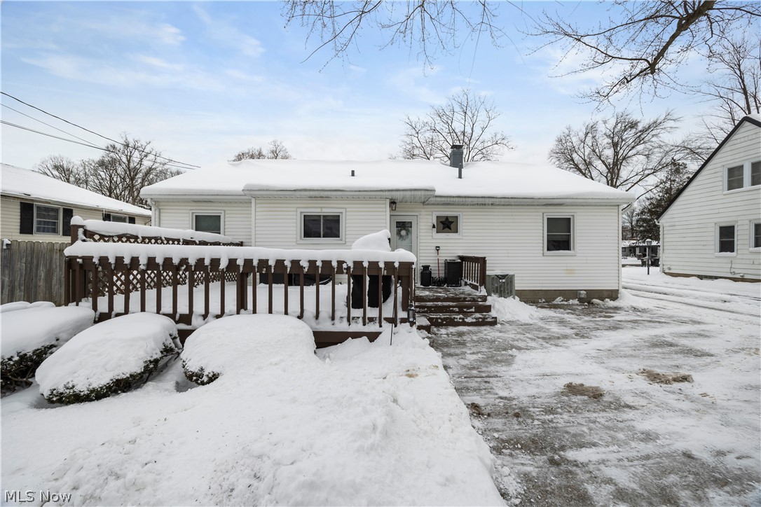 965 Gulf Road Elyria, OH 44035 - Photo 33 of 37 Snow covered rear photo with a wooden deck