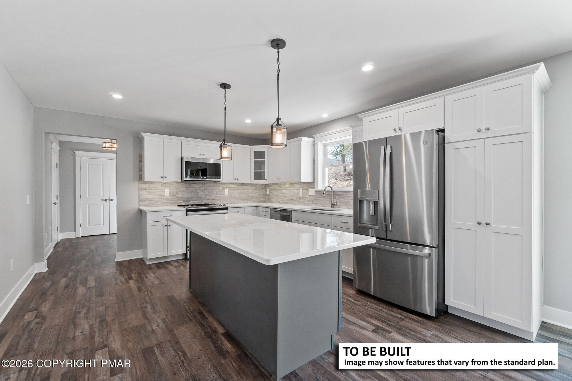 Lot 31 Greenview Court Kunkletown, PA 18058 - Photo 3 of 8 a large kitchen with stainless steel appliances granite countertop a refrigerator a oven and a sink with wooden floor