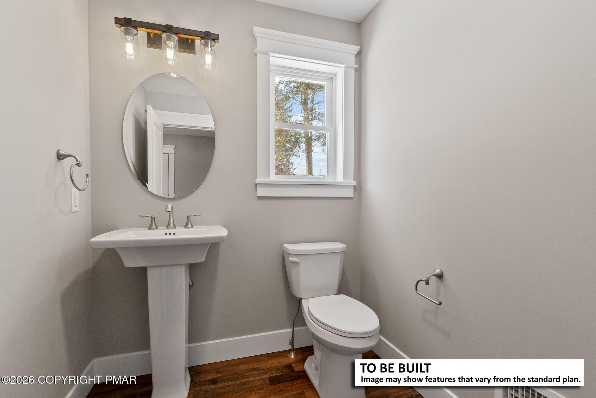 Lot 31 Greenview Court Kunkletown, PA 18058 - Photo 4 of 8 a bathroom with a toilet a sink and mirror