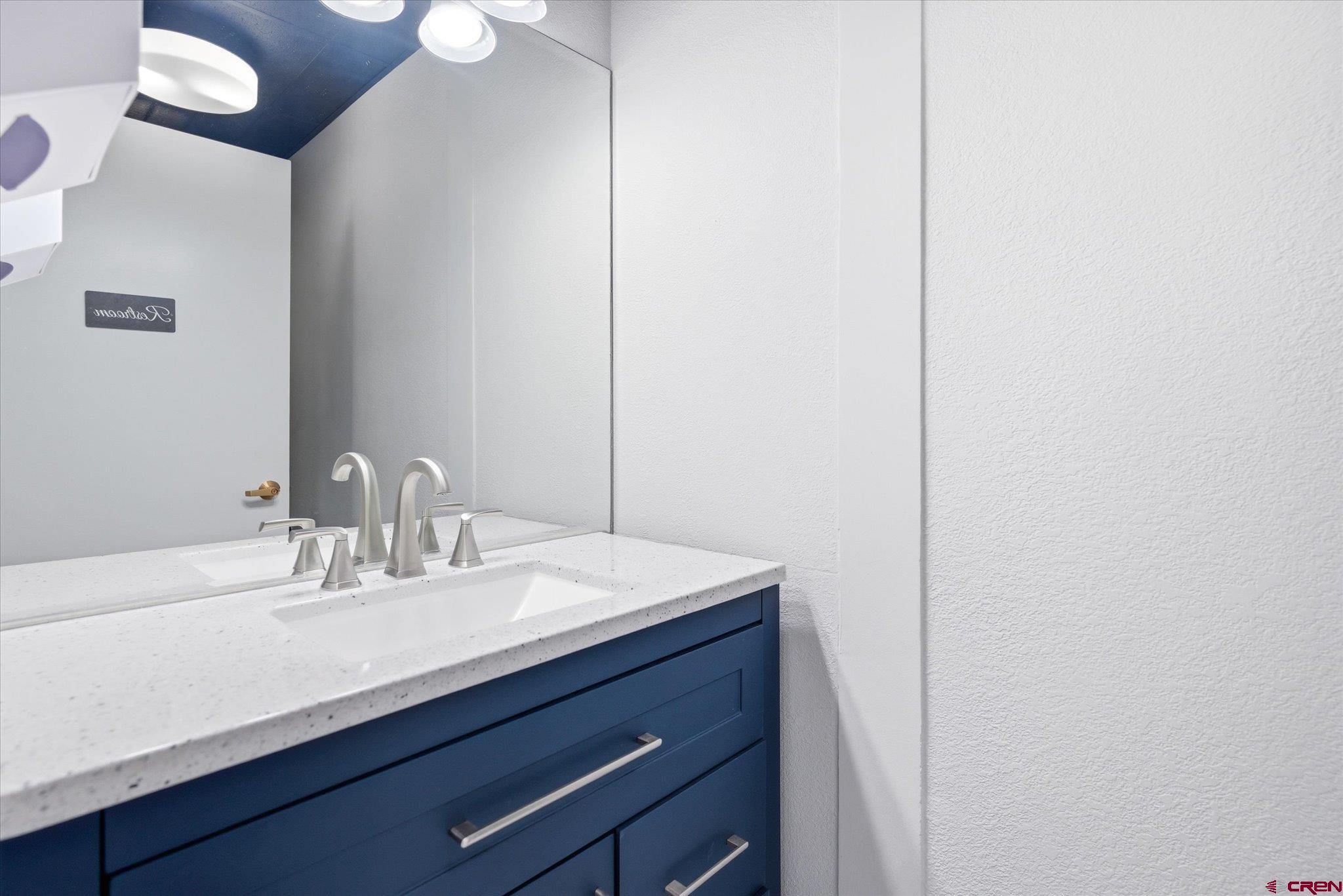 2901 Main Avenue Durango, CO 81301 - Photo 13 of 24 a sink with a mirror