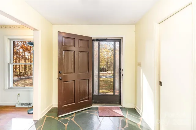 a view of livingroom with furniture and windows