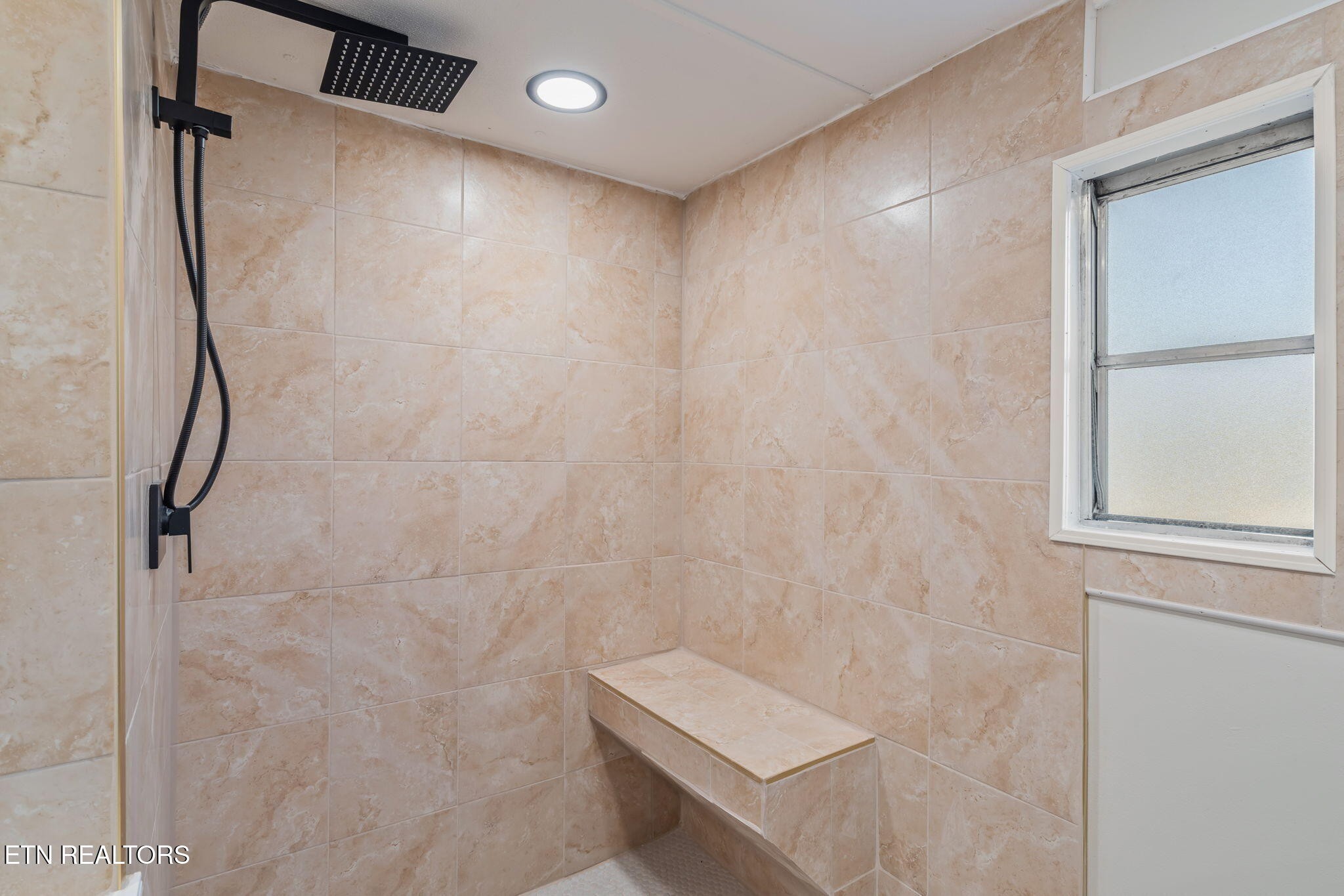 817 Vanessa Way Heiskell, TN 37754 - Photo 15 of 31 a bathroom with a shower and a toilet