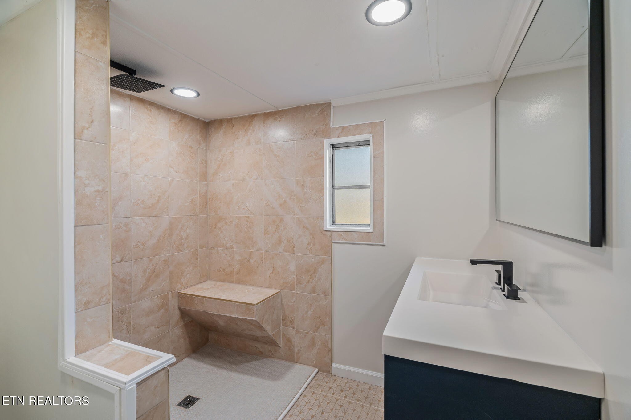 817 Vanessa Way Heiskell, TN 37754 - Photo 16 of 31 a bathroom with a sink toilet and vanity