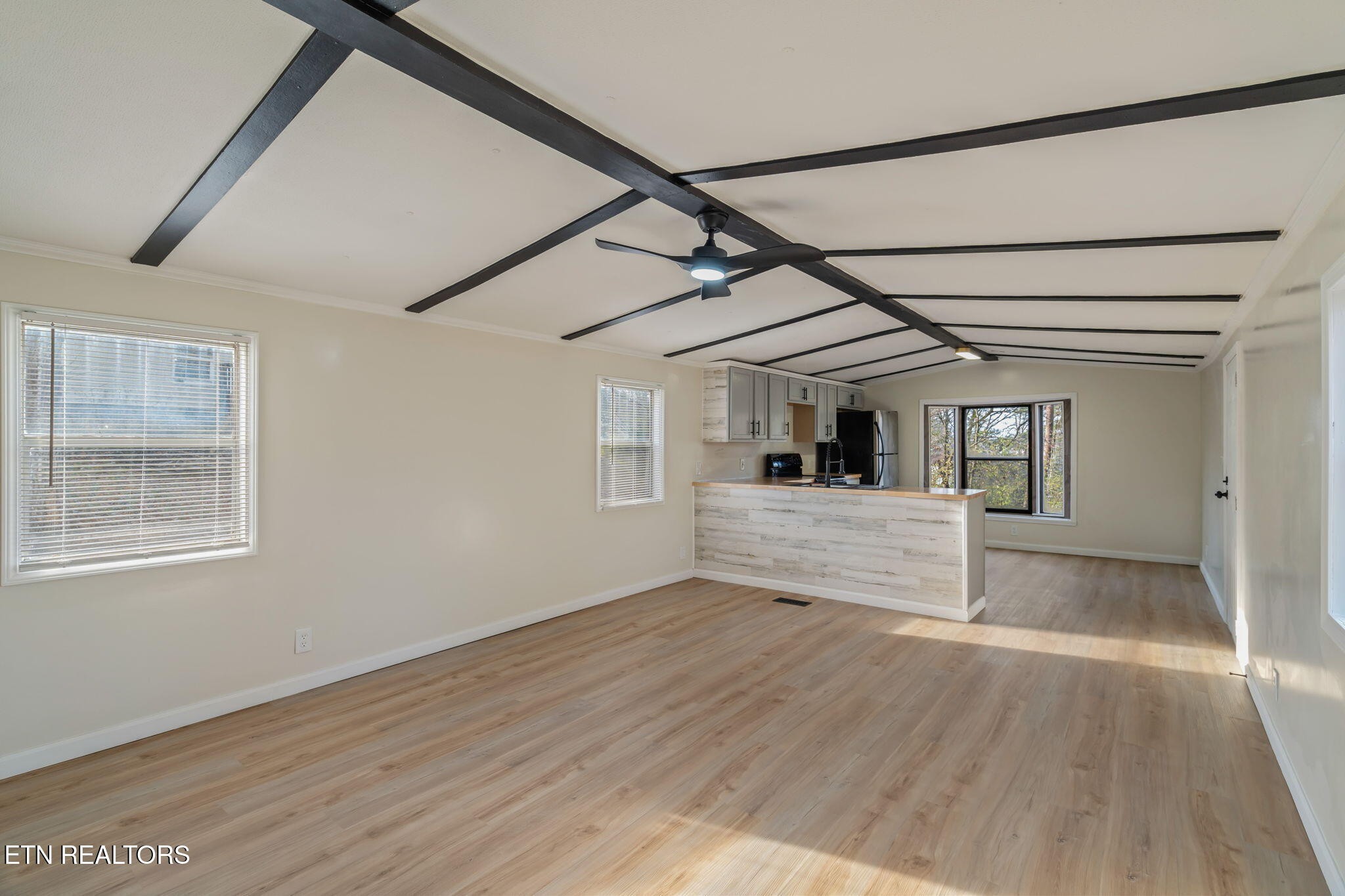 817 Vanessa Way Heiskell, TN 37754 - Photo 5 of 31 a view of hallway with wooden floor and a window