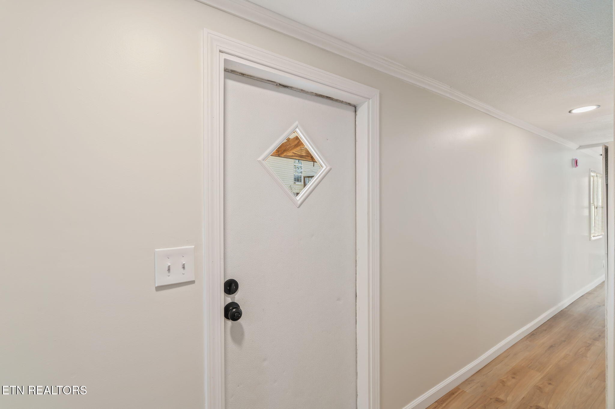 817 Vanessa Way Heiskell, TN 37754 - Photo 9 of 31 a bathroom with a light fixture and a shower